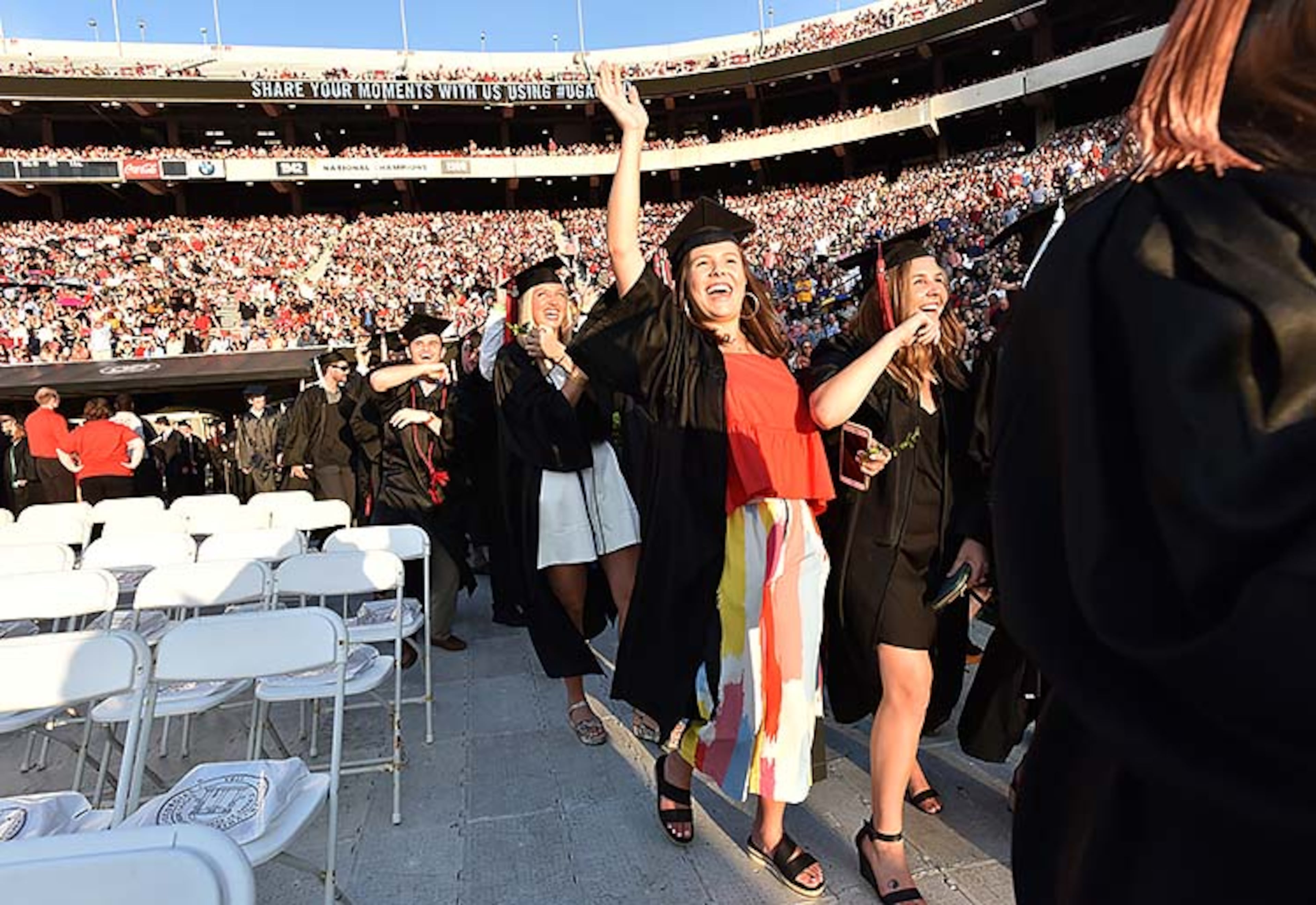 May 10, 2019 Athens - University of Georgia students celebrate as they enter for 2019 spring undergraduate commencement ceremony at Sanford Stadium in Athens on Friday, May 10, 2019. HYOSUB SHIN / HSHIN@AJC.COM