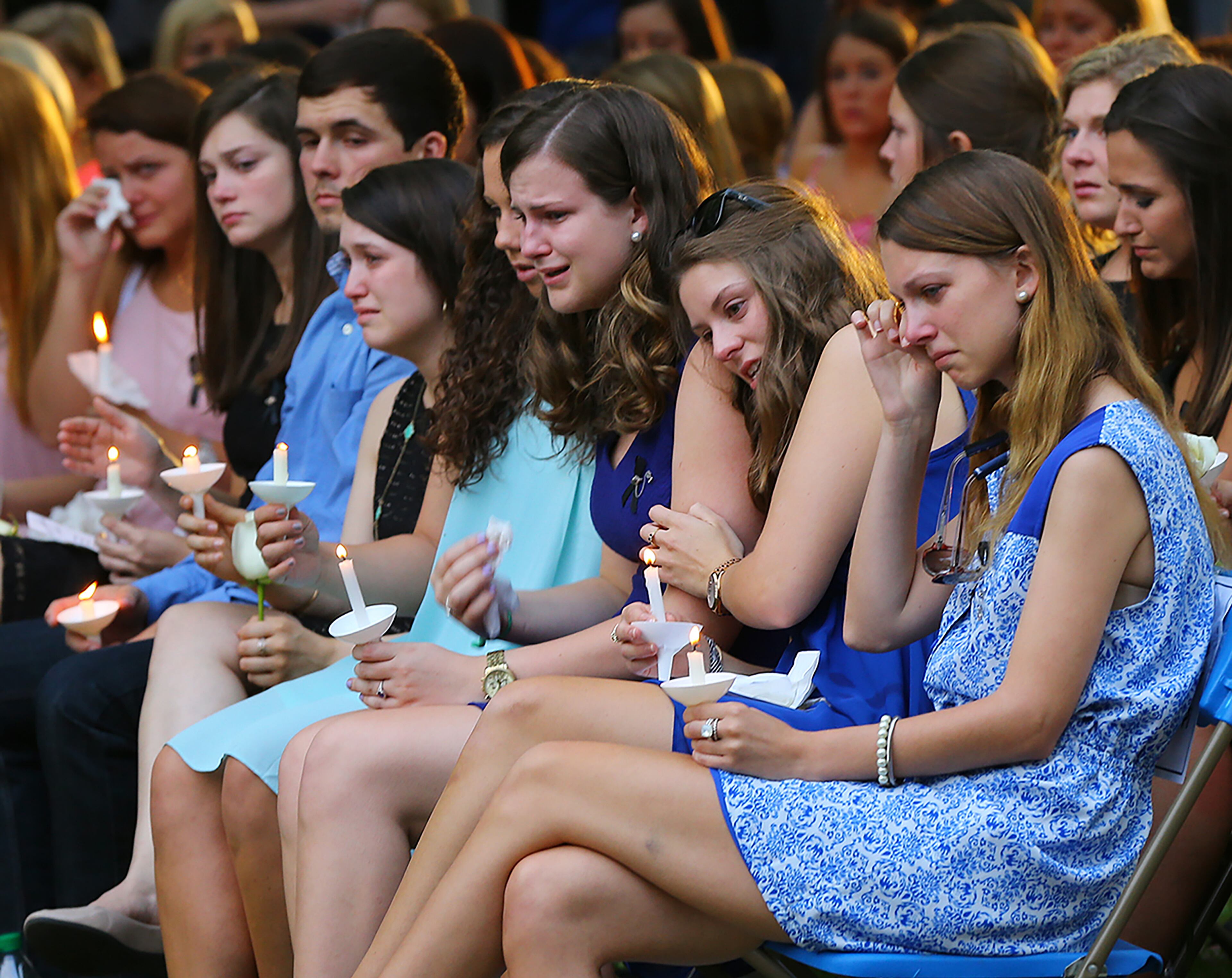 Students hold candles during the Memorial Service on Sweetheart Circle at Georgia Southern University for the five nursing students who died in a vehicle pileup on April 22, 2015, in Statesboro. Curtis Compton / ccompton@ajc.com