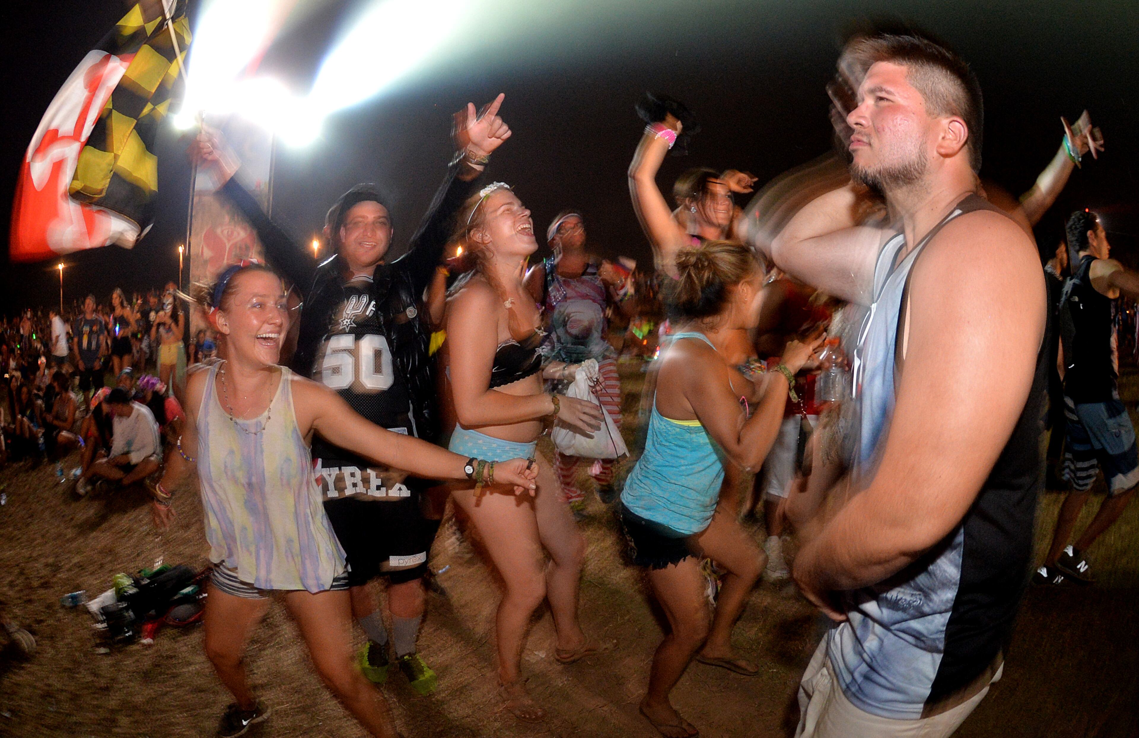 A crowd dances to electronic beats at the TomorrowWorld electronic music festival in Chattahoochee Hills, South of Atlanta, on Saturday, September 27, 2014. HYOSUB SHIN / HSHIN@AJC.COM