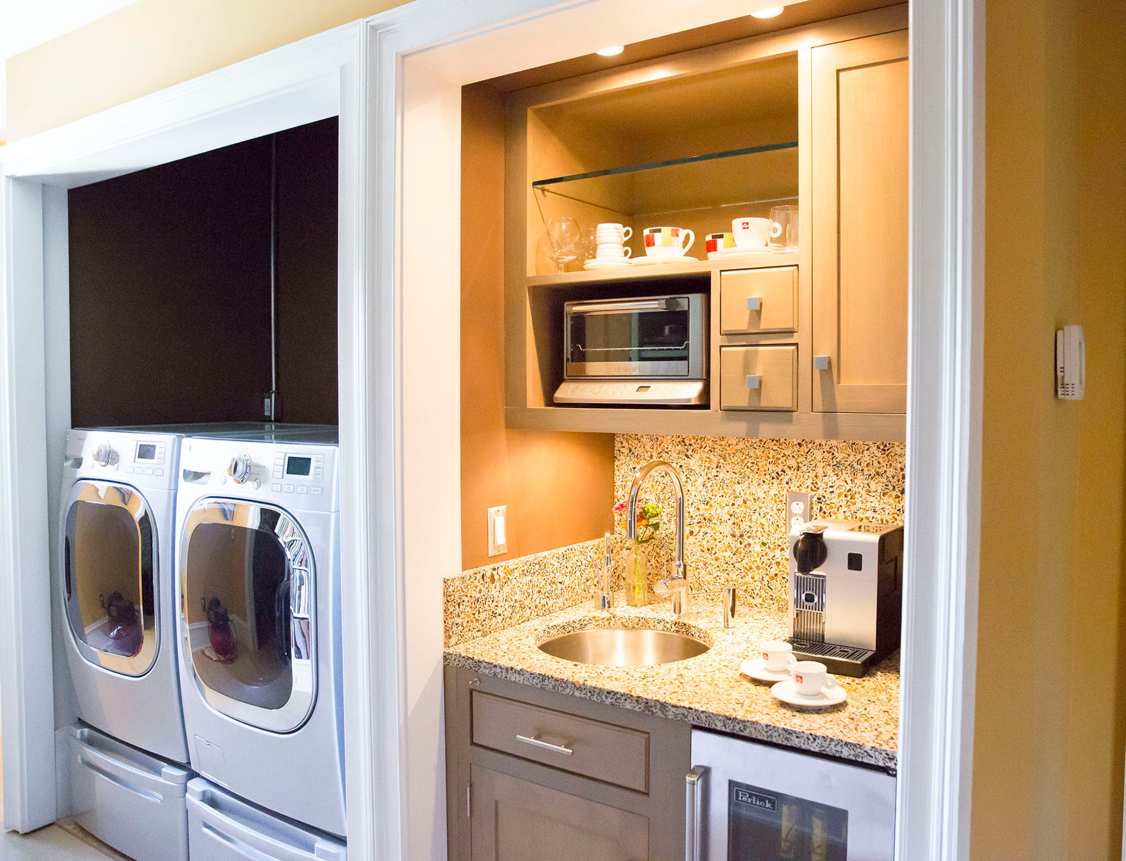 Included in the Surasky's master suite is a conveniently located laundry alcove, as well as a morning kitchen where the couple can prepare coffee to enjoy on the morning porch.