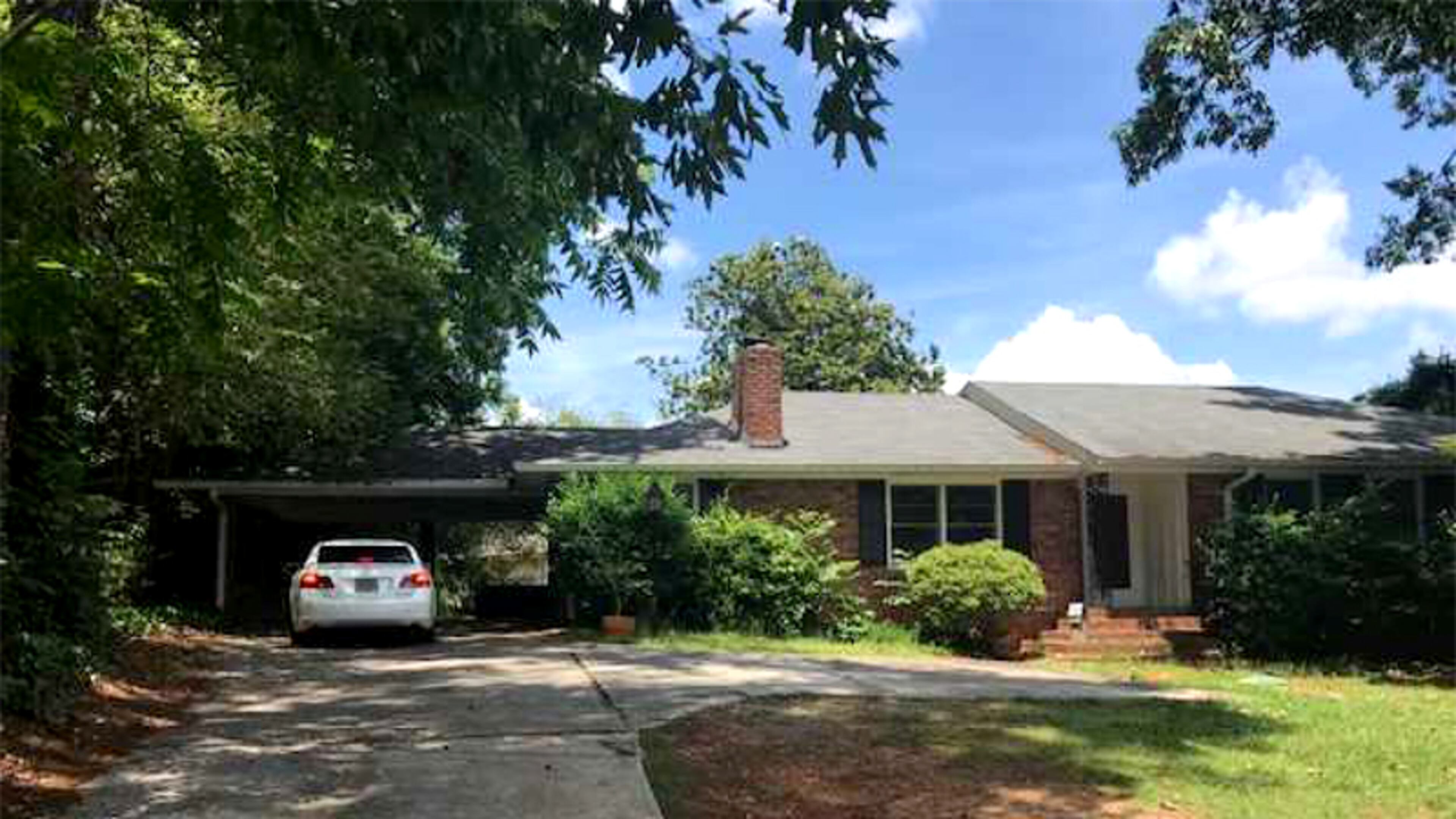 A house and land at 650 Hammond Drive, Sandy Springs, is being sold for $410,000 to the city, which plans to eventually demolish it for a widening of the street. CITY OF SANDY SPRINGS
