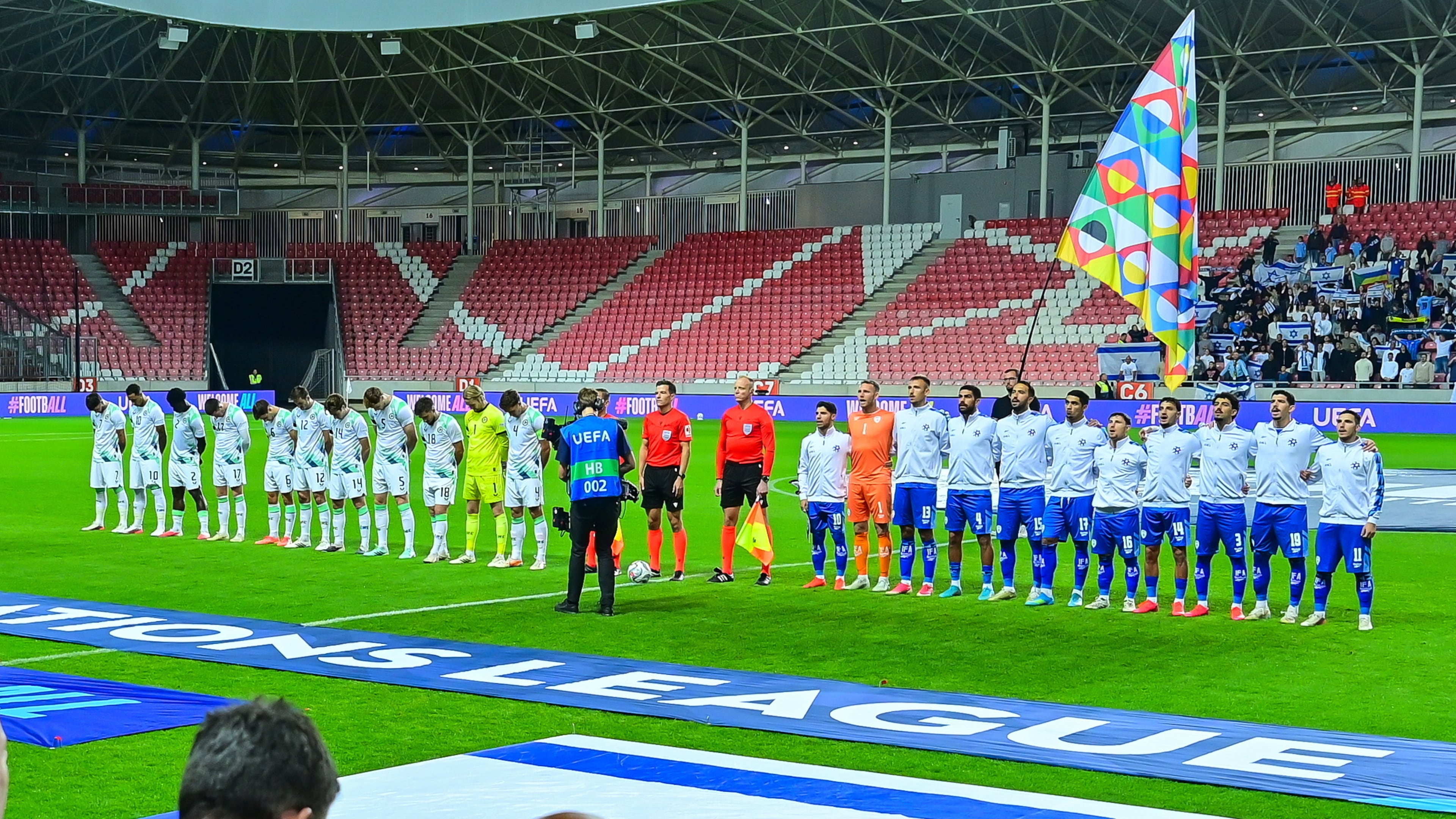 Players of Israel, right, and Ireland stand for the anthems before the UEFA Nations League soccer match between Ireland and Israel in Debrecen, Hungary, Sunday, Sept. 27, 2026. (Zsolt Czegledi/MTI via AP)