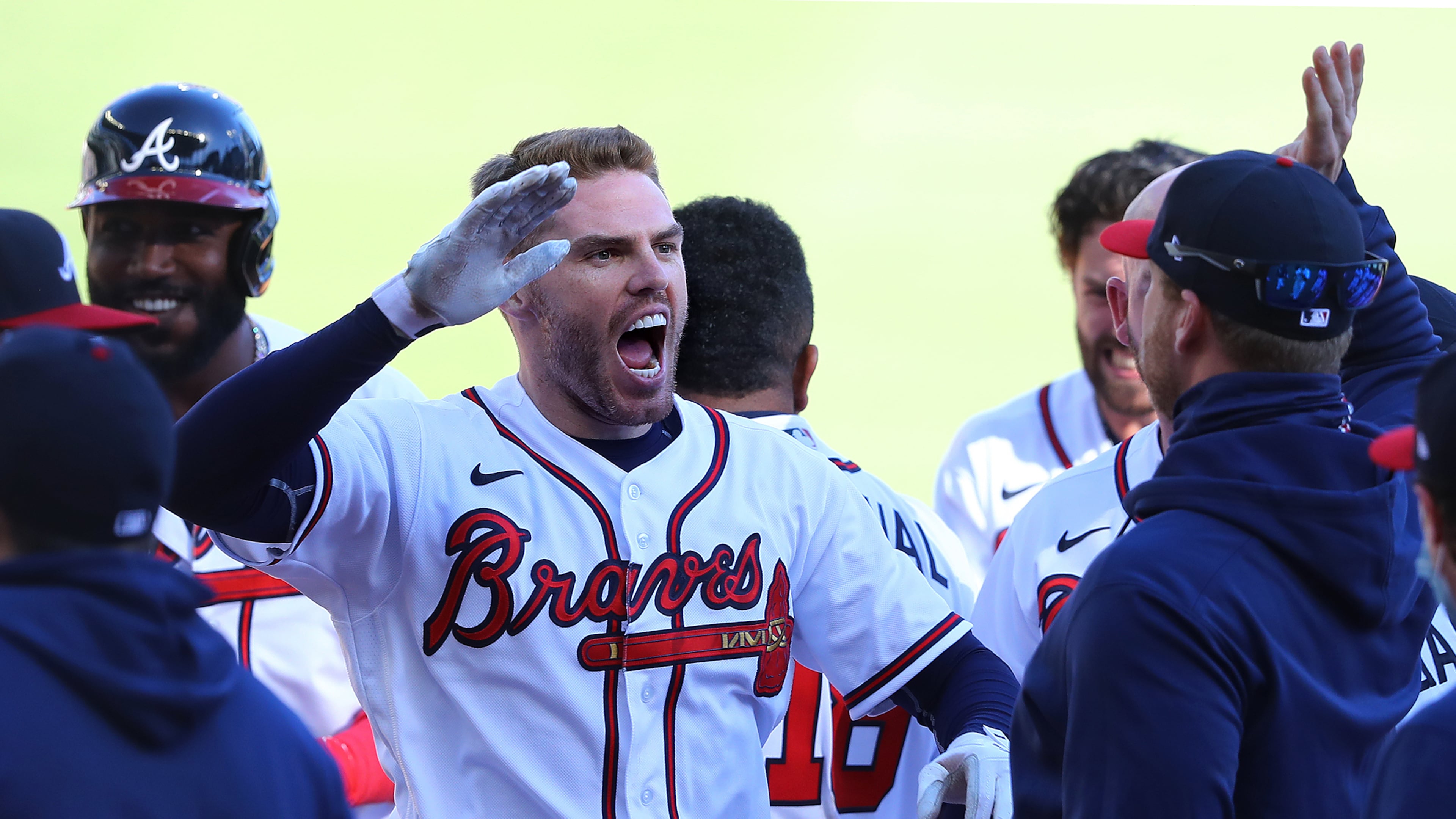 Braves win Game 1: Freddie Freeman celebrates his game-winning hit at the end of Wednesday's game against the Reds in the National League Wild Card round. Freeman's 13th-inning single drove in pinch-runner Cristian Pache for the 1-0 win and a 1-0 lead in the best-of-three series. Game 2 will be played Thursday at Truist Park.