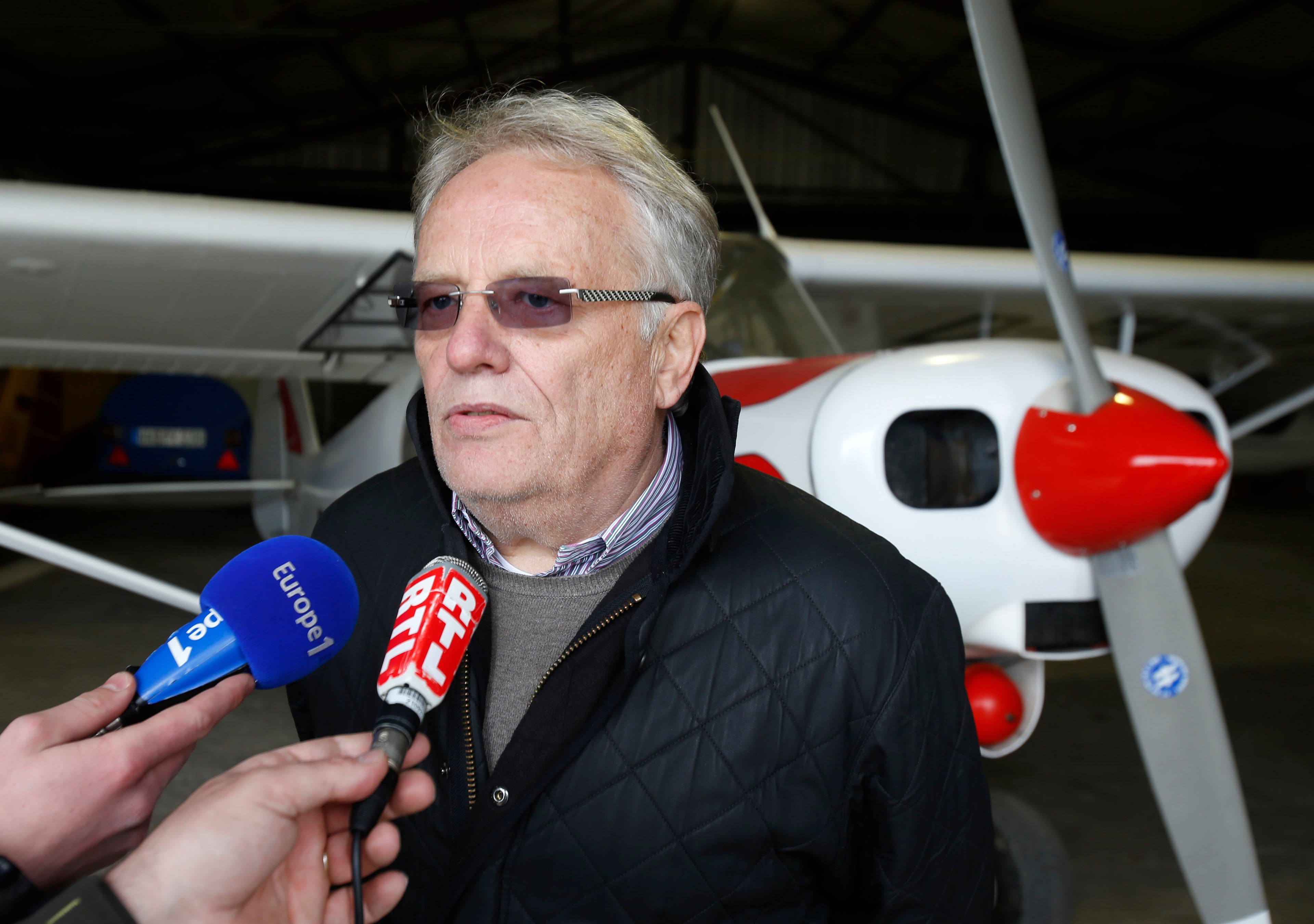 Klaus Radke, chairman of the aviation club Westerwald, talks to journalists in Montabaur, Germany, Thursday, March 26, 2015. Club member Andreas Lubitz was the copilot on flight Germanwings 9525 that crashed with 150 people on board on Tuesday in the French Alps. (AP Photo/Michael Probst)