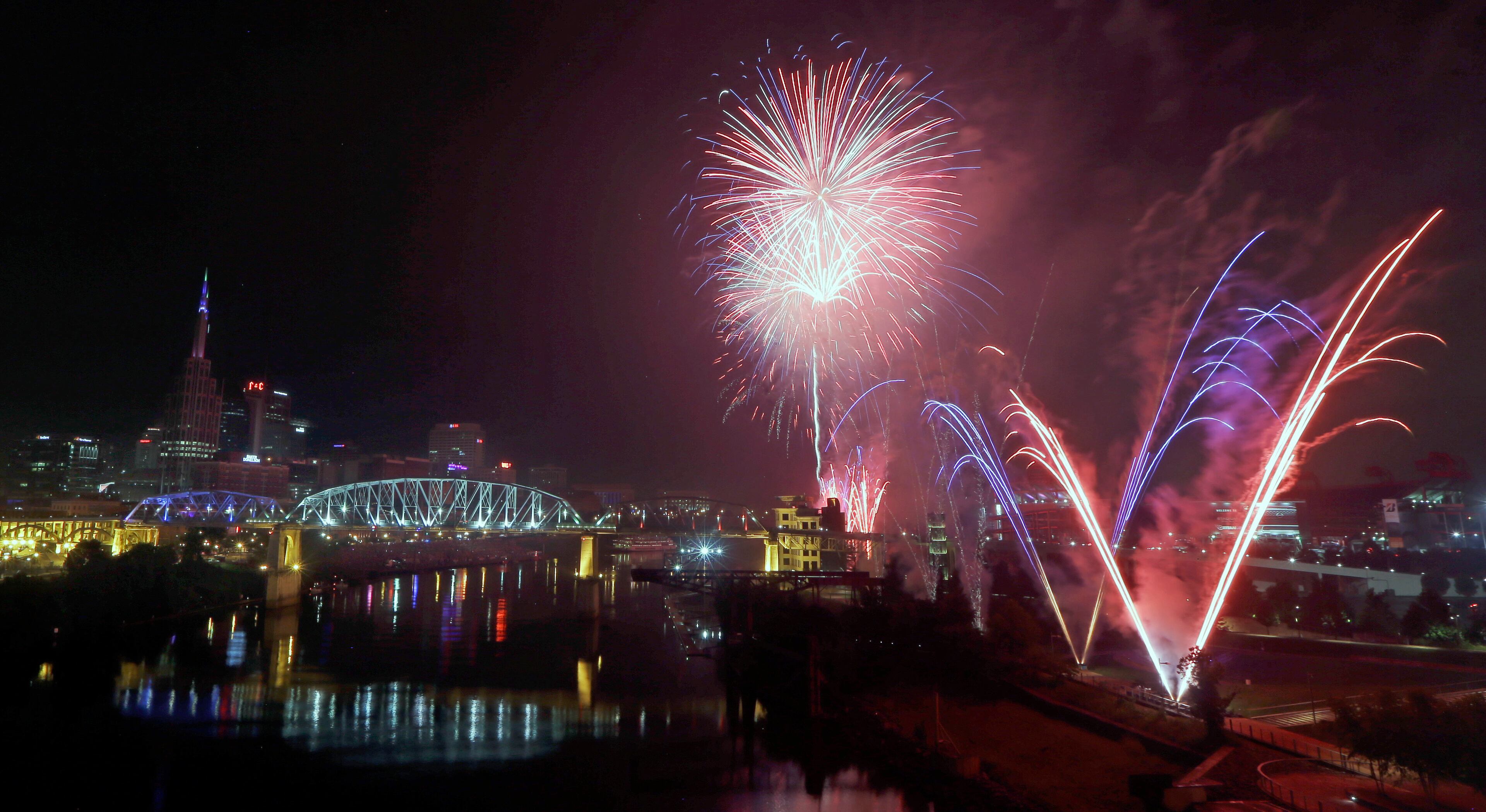 Fourth of July fireworks explode over the Cumberland River Monday, July 4, 2016, in Nashville, Tenn. The Independence Day fireworks display is the largest in the country. (AP Photo/Mark Humphrey)
