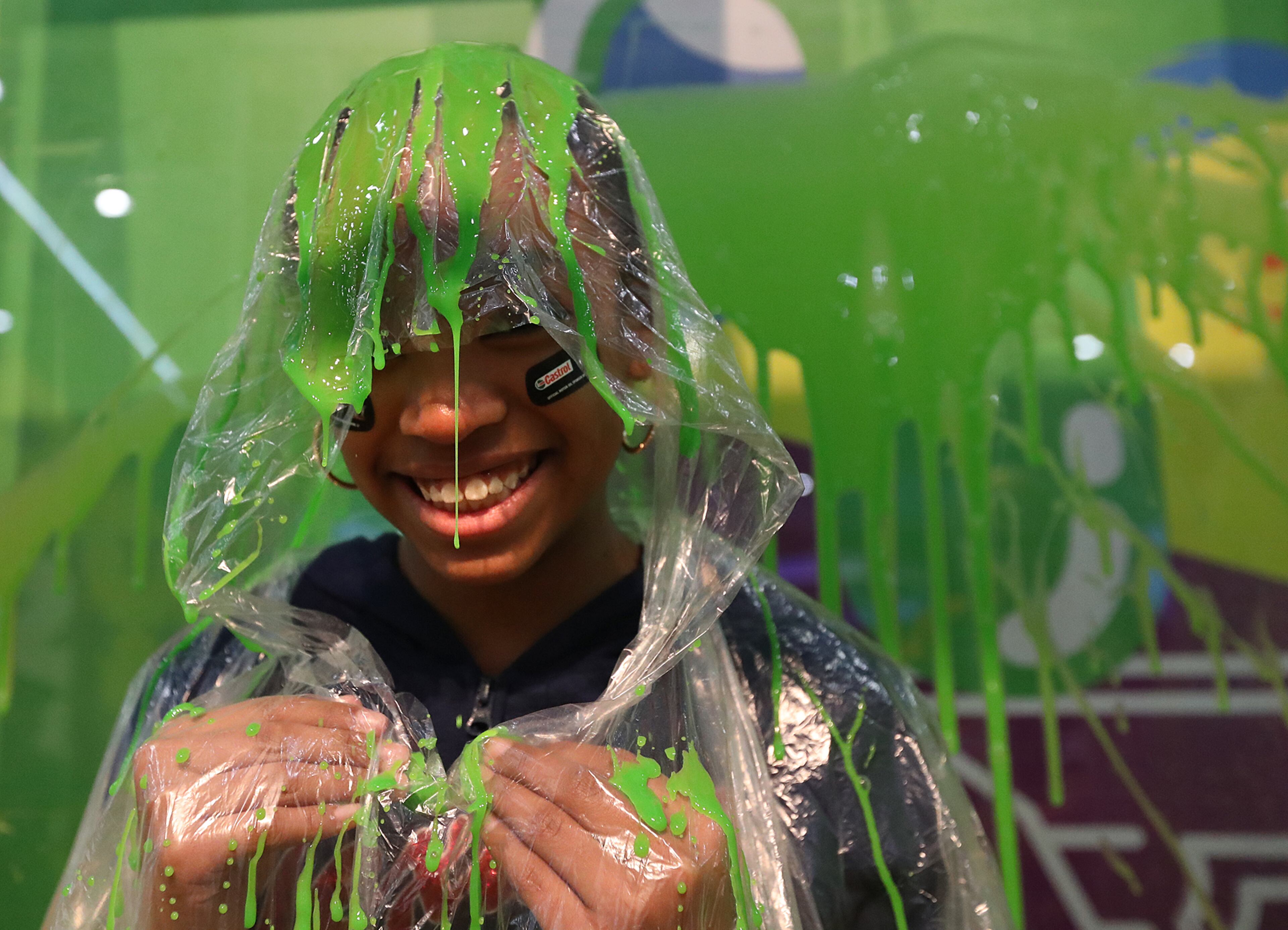 February 4, 2017, Houston: Samarhi Smalls, Houston, gets slimed at the Nickelodeon booth during the NFL Experience on Saturday Feb. 4, 2017, in Houston. Curtis Compton/ccompton@ajc.com