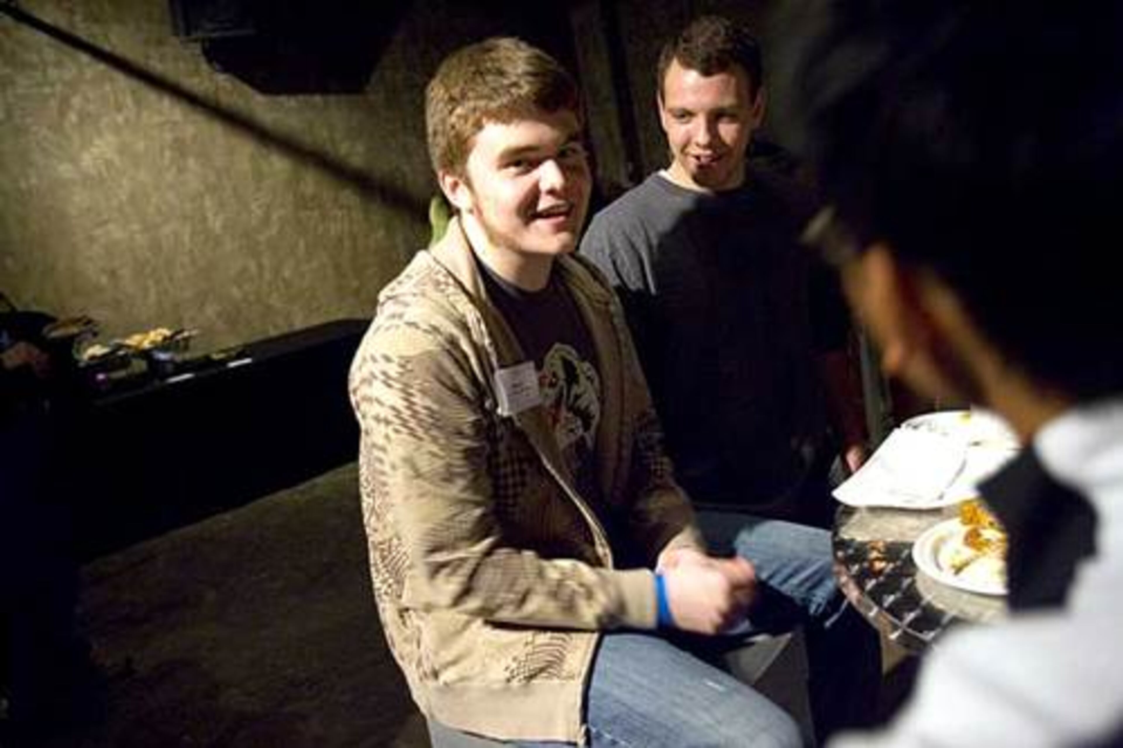 First-year Georgia Tech student Kevin Blasko (left) hangs out with fellow students John Koch and Joseph Lee before the Guitar Hero III Championship Play-Off.