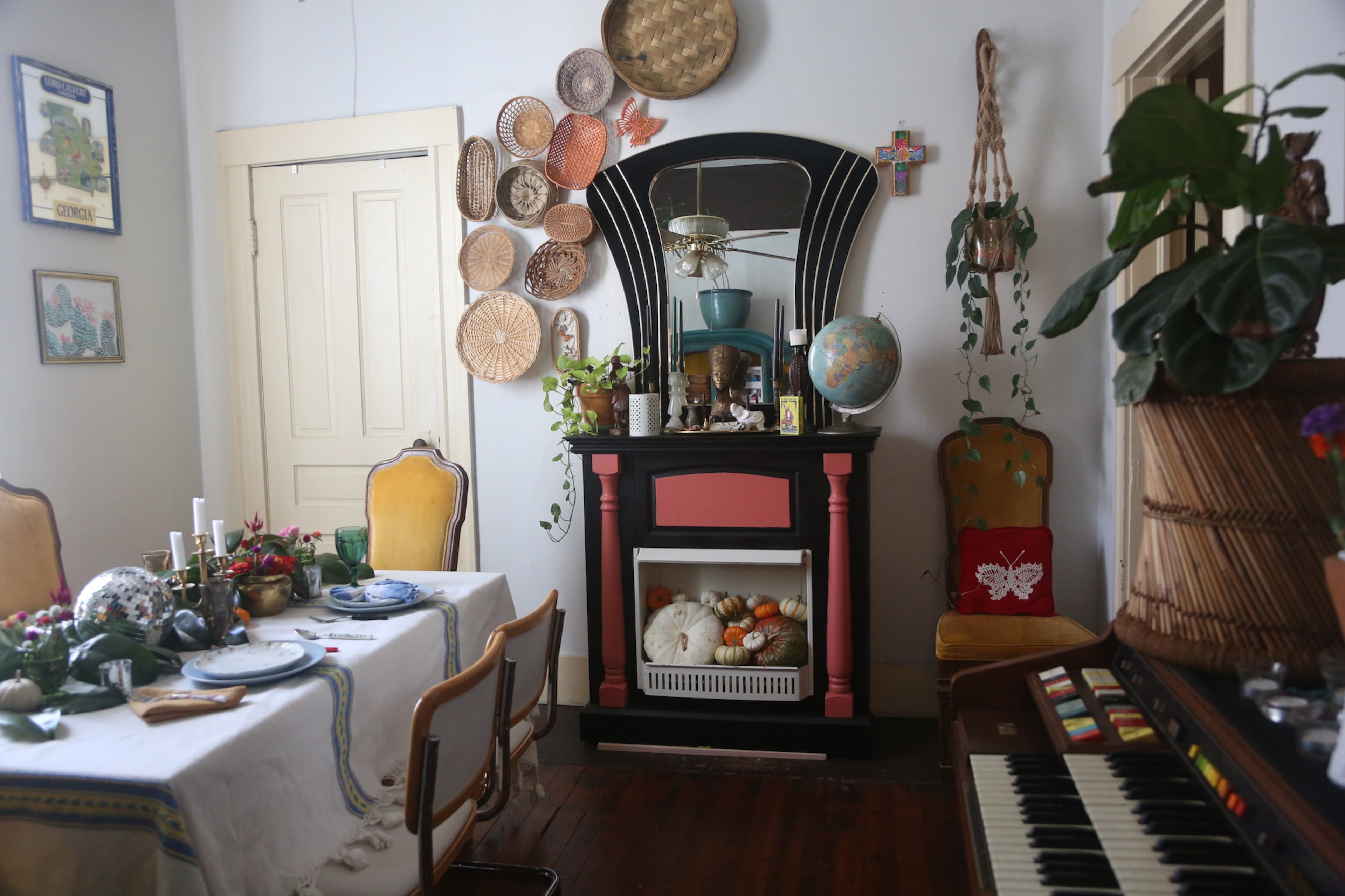 Musical influences and instruments, such as the organ, are key elements in the home. But the faux fireplace, painted dramatic black and pink, is one of Augusta Wheeler's favorite elements. She found it at a yard sale and has it in her dining room. "I just keep repainting it for whatever my vibe is," she said.
