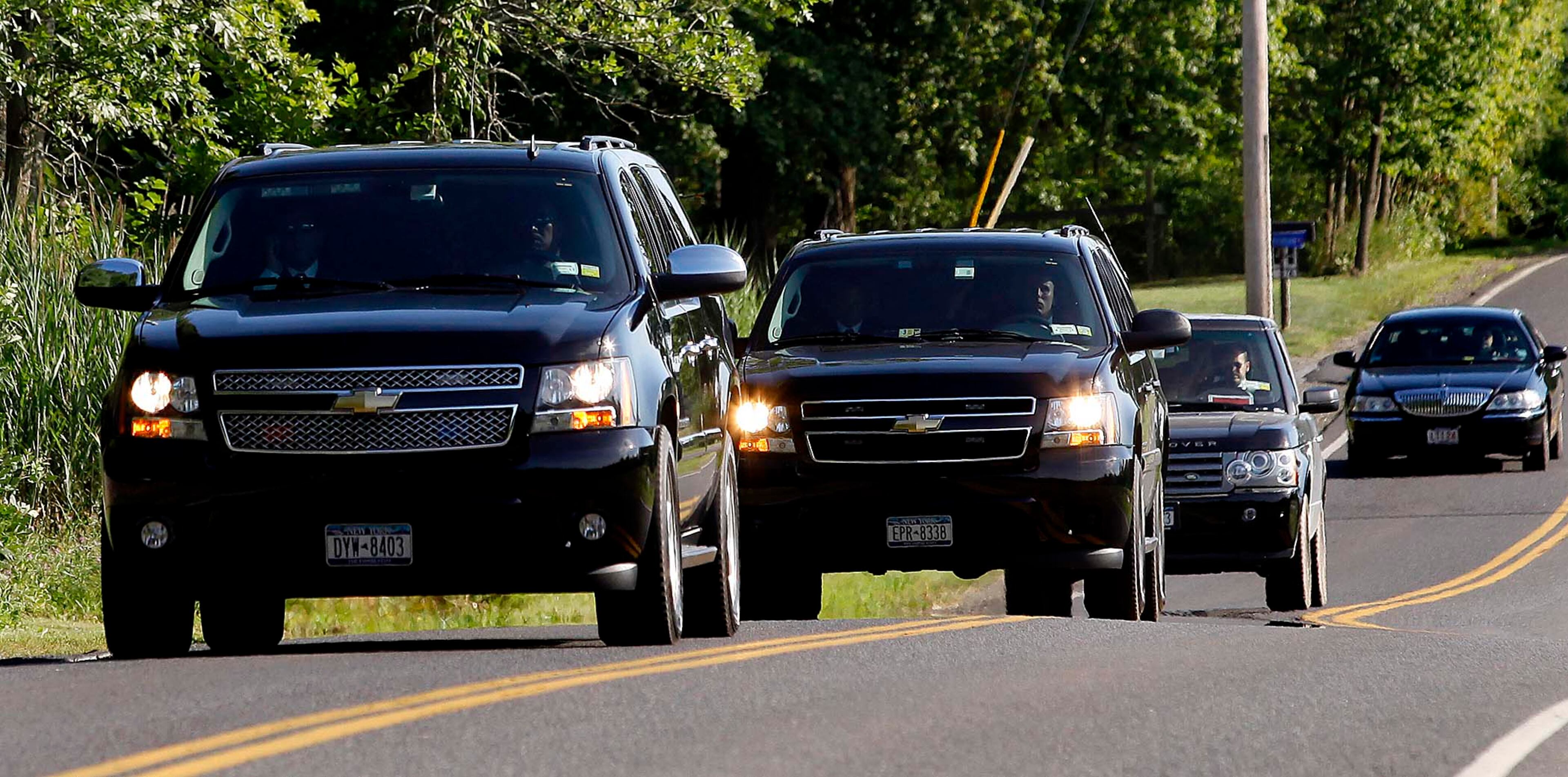 The Clinton motorcade travels along River Road in Rhinebeck, N.Y. on the way to Chelsea Clinton's wedding Saturday afternoon, July 31, 2010. (Craig Ruttle/Newsday)