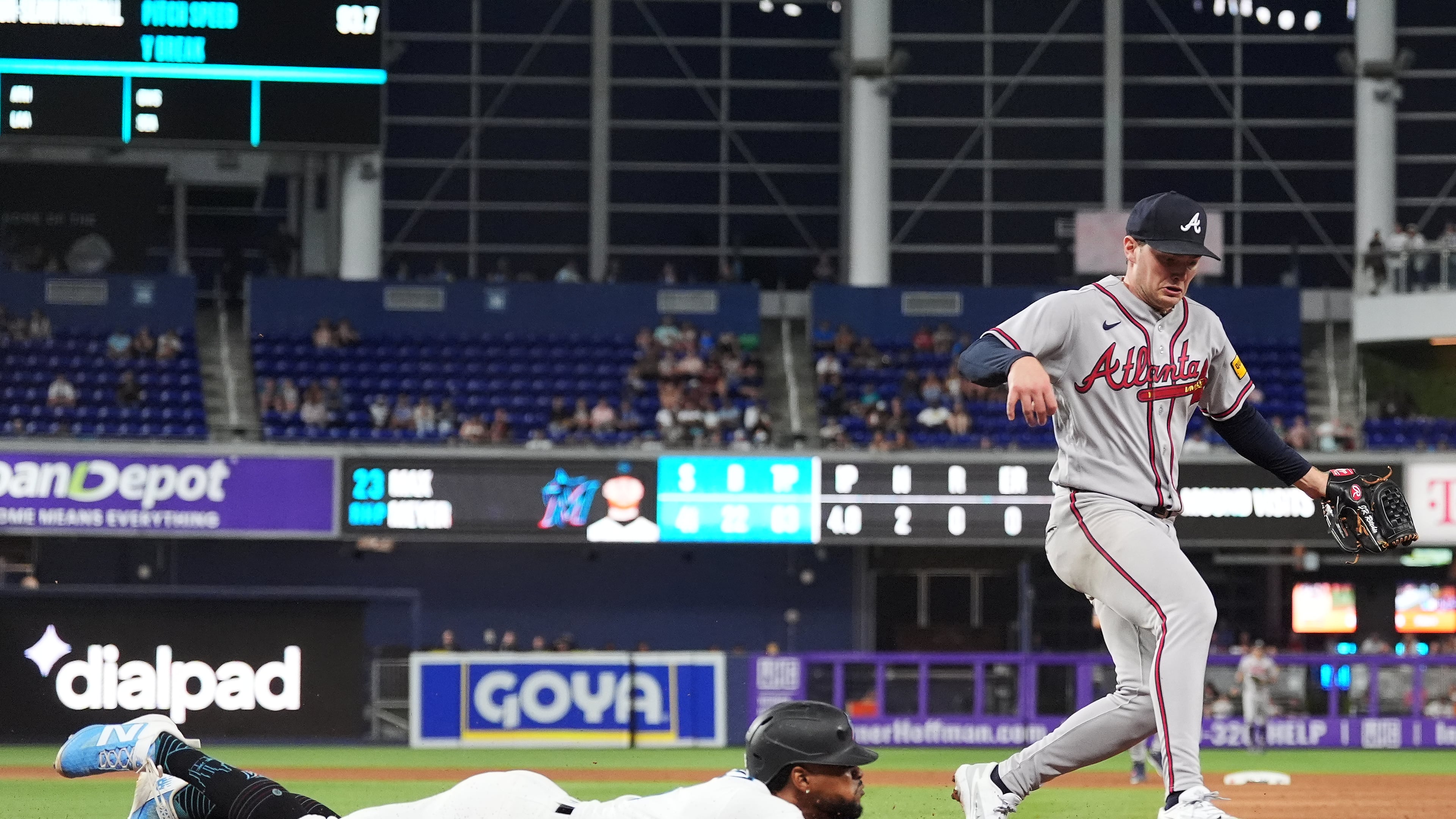 Atlanta Braves starting pitcher JR Ritchie, right, runs to get out Miami Marlins' Otto Lopez at first base on a ground out, during the fourth inning of a baseball game, Monday, May 18, 2026, in Miami. (Rebecca Blackwell/AP)