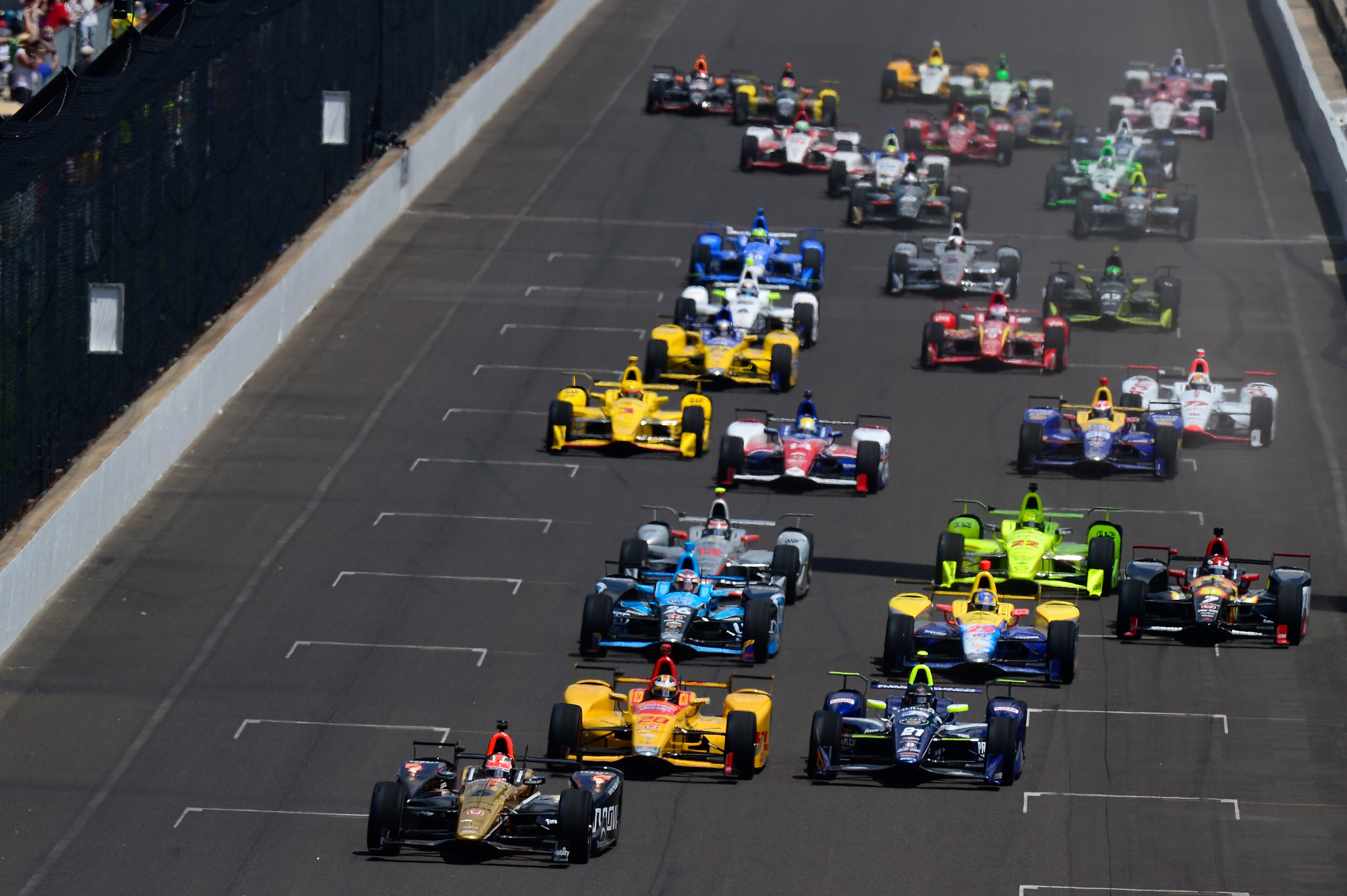 INDIANAPOLIS, IN - MAY 29: James Hinchcliffe of Canada, driver of the #5 ARROW Schmidt Peterson Motorsports Chevrolet, leads the field at the start of the 100th running of the Indianapolis 500 at Indianapolis Motorspeedway on May 29, 2016 in Indianapolis, Indiana. (Photo by Robert Laberge/Getty Images)