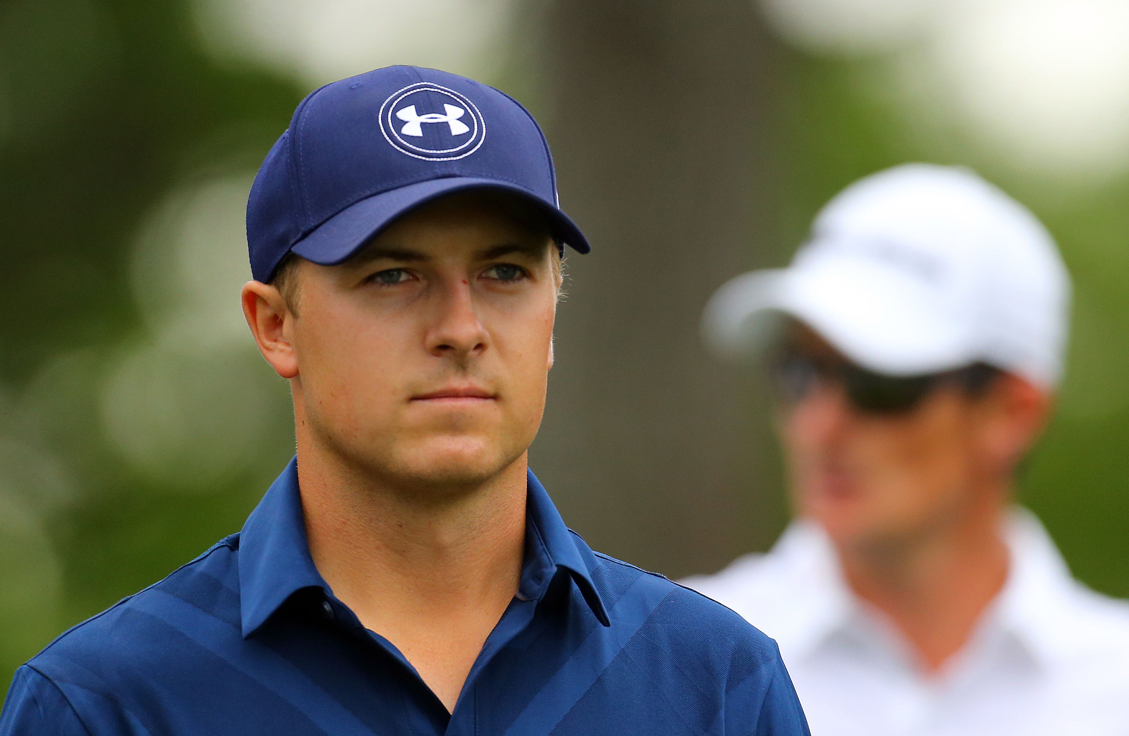 Jordan Spieth and Justin Rose leave the #9 tee. Photos from the final round at the Masters Golf Tournament, Sunday, April 12, 2015. CURTIS COMPTON/CCOMPTON@AJC.COM