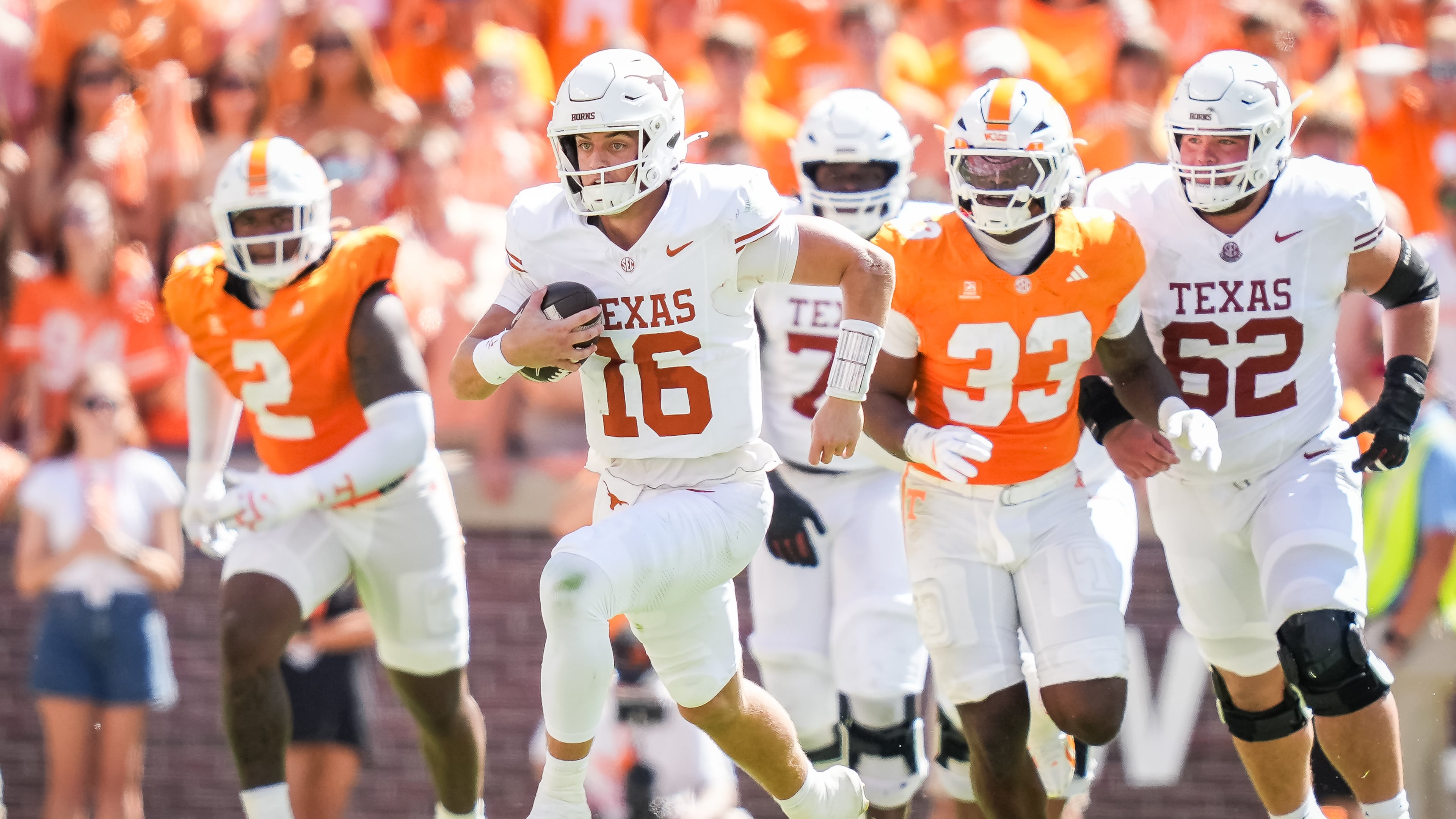 Texas quarterback Arch Manning (16) runs the ball during the first half an NCAA college football game against Tennessee in Knoxville, Tenn., Saturday, Sept. 26, 2026. (Sara Diggins/The San Antonio Express-News via AP)