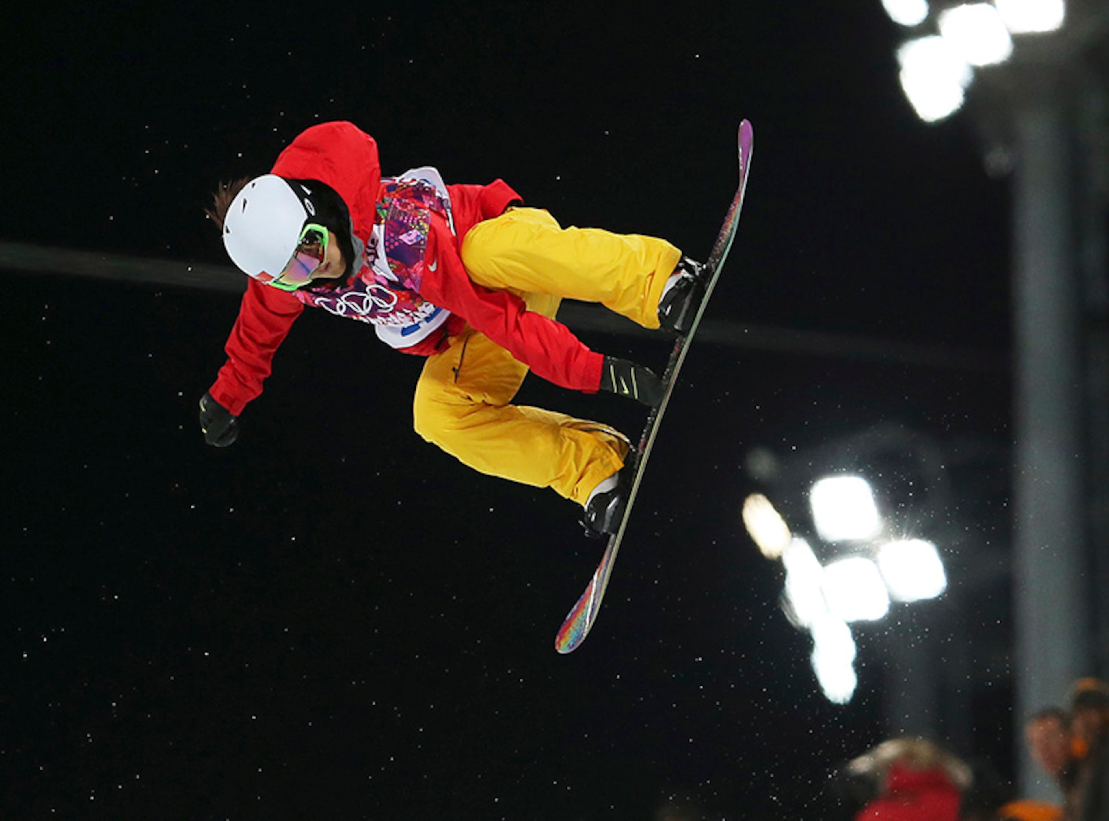 China's Liu Jiayu competes in the women's snowboard halfpipe semifinal at the Rosa Khutor Extreme Park, at the 2014 Winter Olympics, Wednesday, Feb. 12, 2014, in Krasnaya Polyana, Russia.