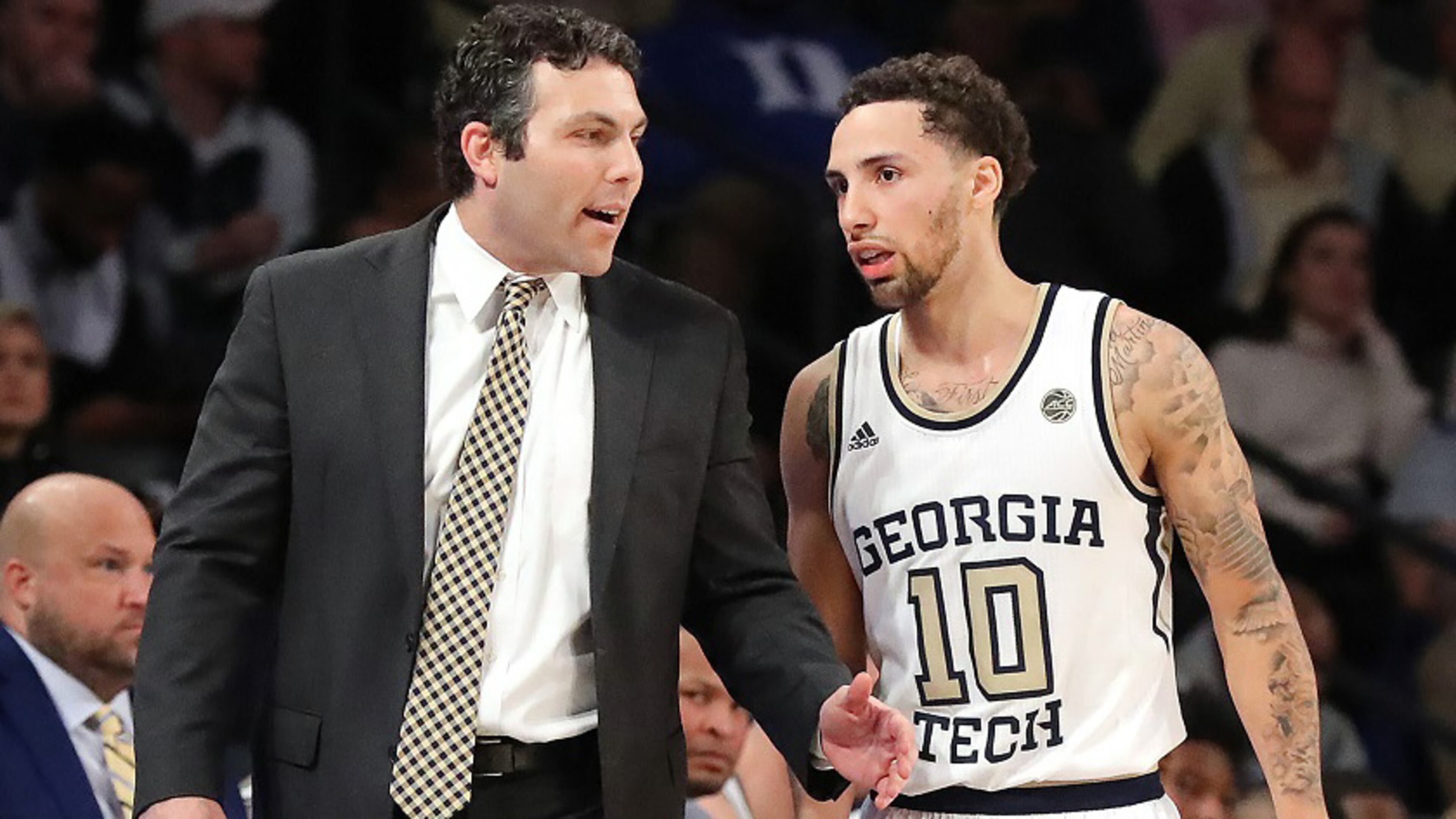 Georgia Tech coach Josh Pastner confers with guard Jose Alvarado in a tight contest with Duke on Wednesday, January 8, 2020, in Atlanta. Curtis Compton ccompton@ajc.com