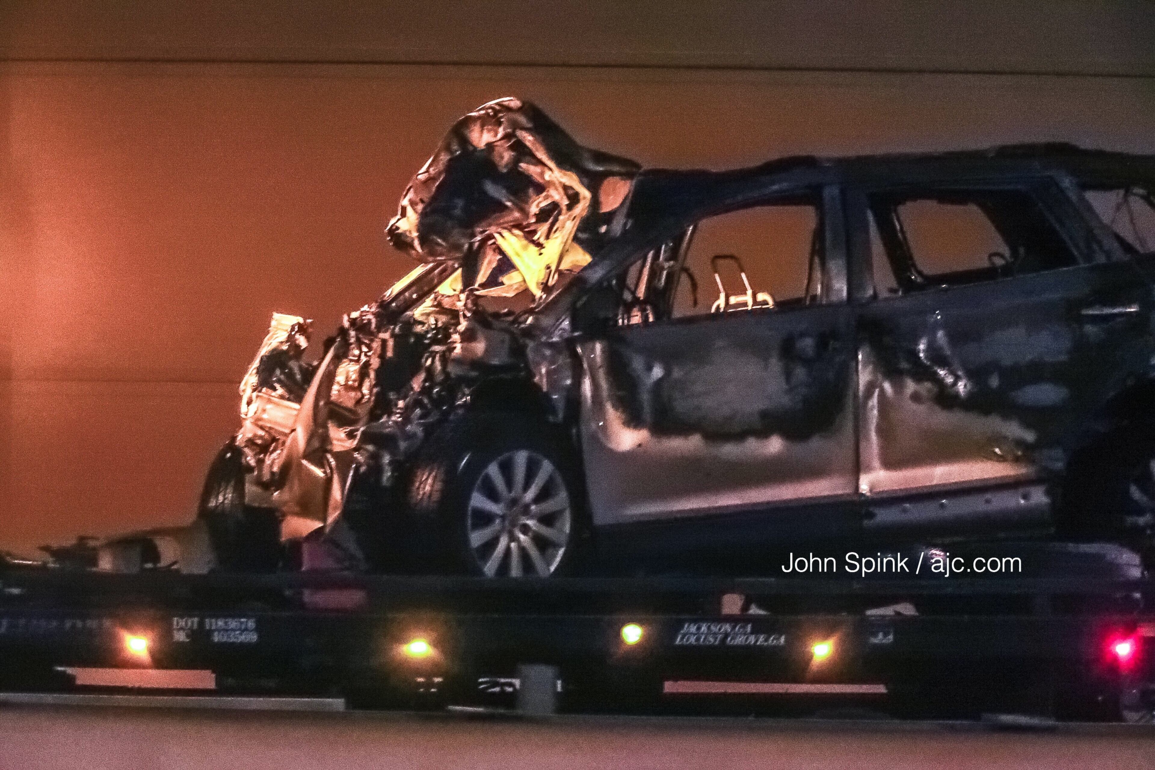 The Georgia Department of Transportation confirmed to Channel 2 Action News the fiery wreck was the result of a police chase and is being investigated as a fatal crash. JOHN SPINK / JSPINK@AJC.COM