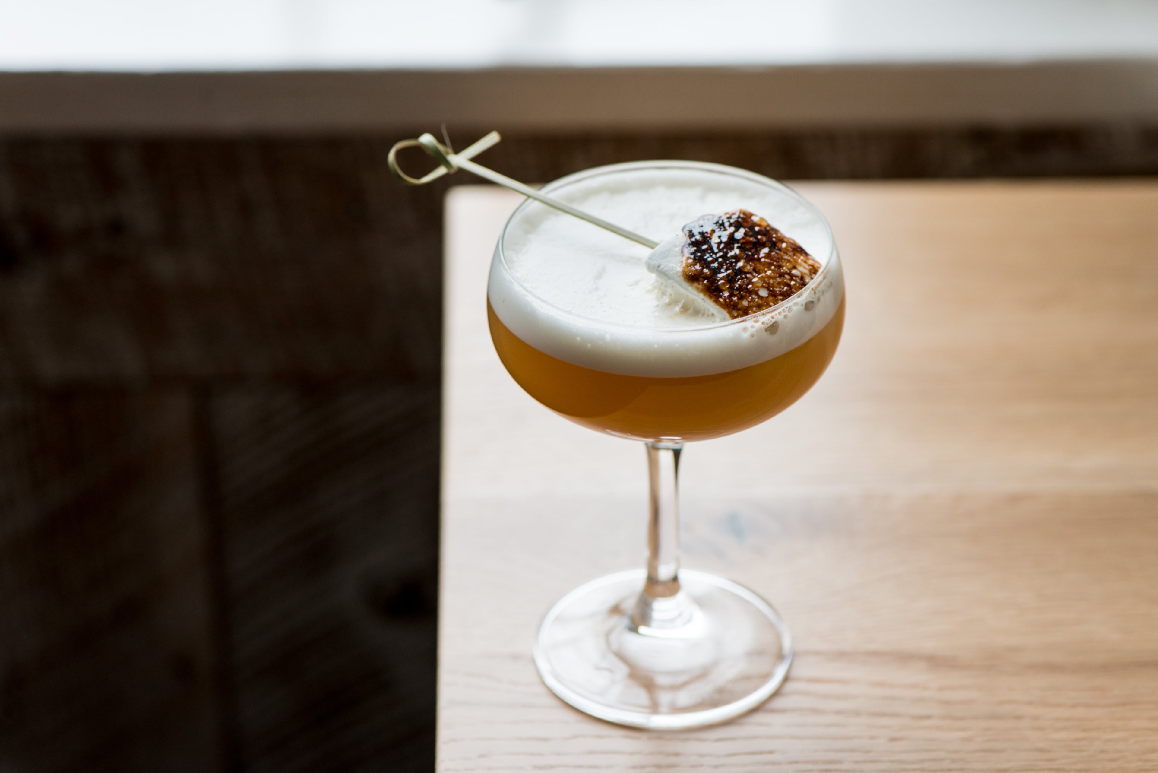 Mi amor es de Coyoacán cocktail with Peloton de la Muerte Mezcal, Cocoa-Coffee infused Punt e Mes, Damiana Liqueur, lime, honey, egg white at Scout in Oakhurst. / Photo credit- Mia Yakel.