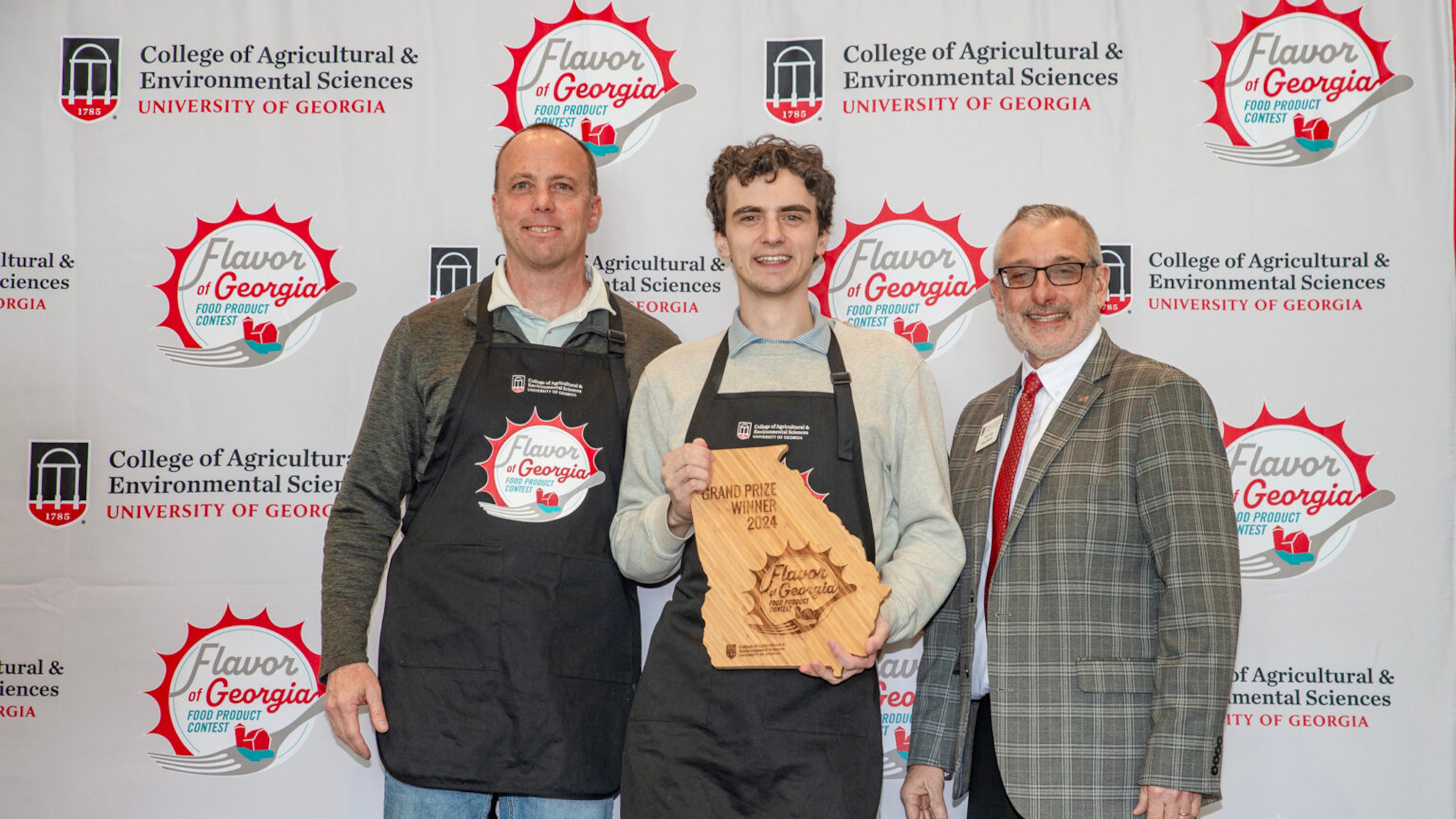 (L to R) New Creation Soda Works founder and CEO Paul Kooistra, head brewer Alex Harding, College of Agriculture and Environmental Sciences Dean and director Nick Place. (Photo by Dennis McDaniel)