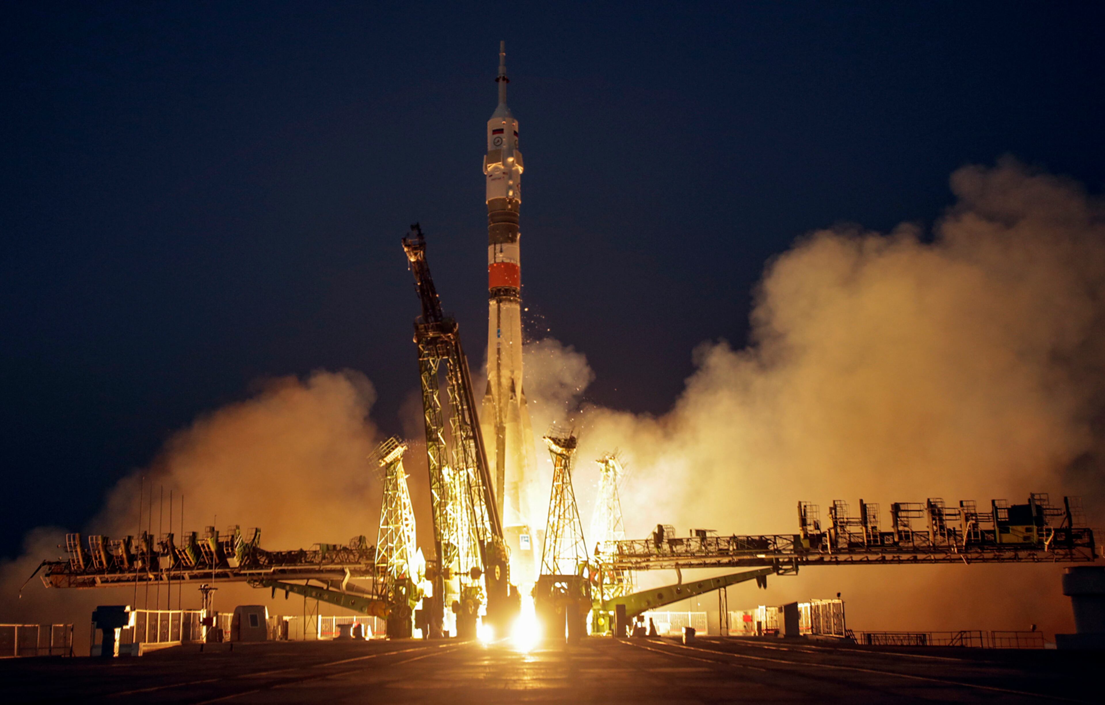 The Soyuz-FG rocket booster with a Soyuz MS-05 space ship carrying a new crew to the International Space Station, ISS, blasts off at the Russian leased Baikonur cosmodrome, Kazakhstan, Friday, July 28, 2017. The Russian rocket carries U.S. astronaut Randy Bresnik, Russian cosmonaut Sergey Ryazanskiy and Italian astronaut Paolo Nespoli. (AP Photo/Dmitri Lovetsky)