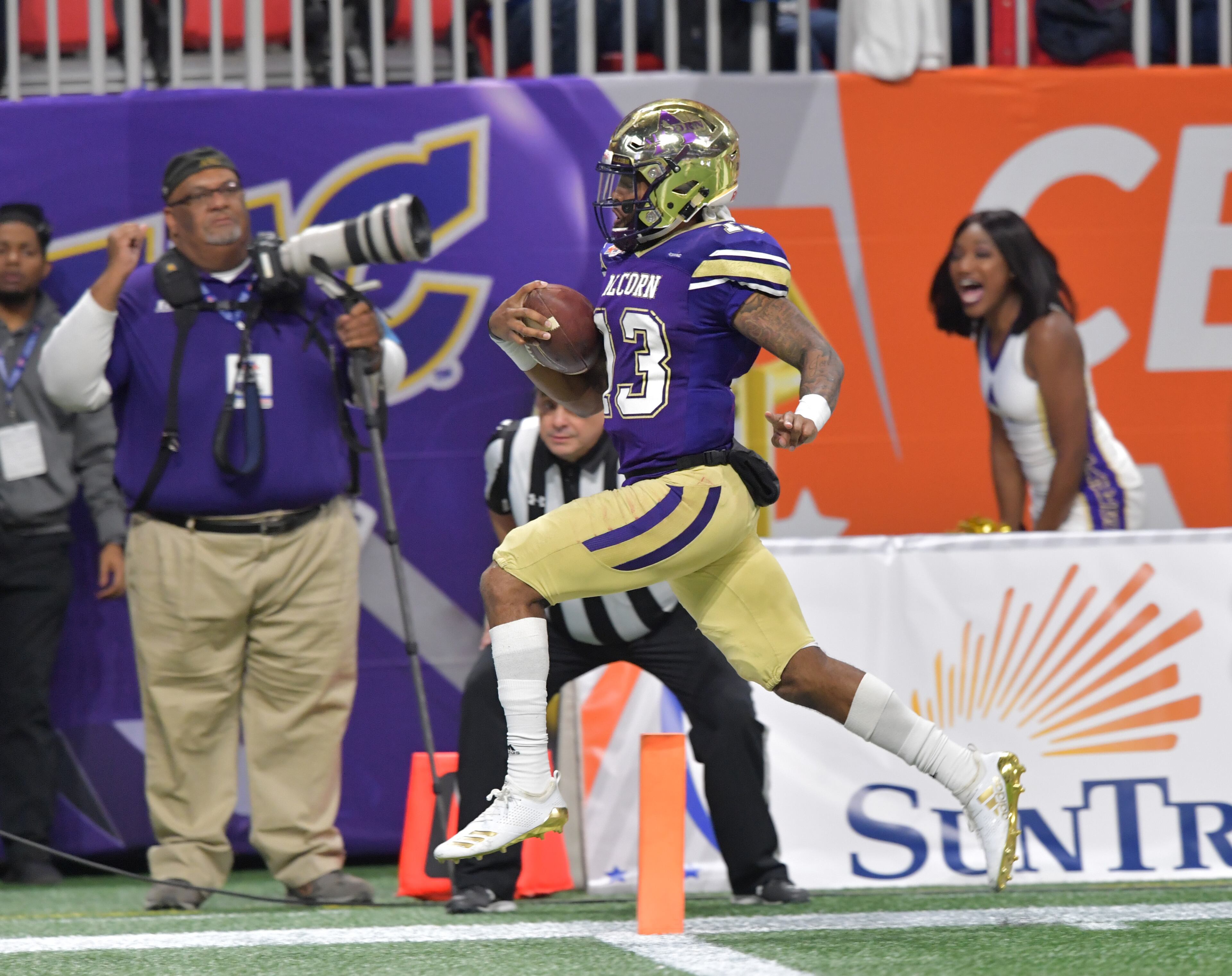 December 15, 2018 Atlanta - Alcorn State quarterback Noah Johnson (13) scores a touchdown during the second half of the 2018 Celebration Bowl at Mercedes-Benz Stadium on Saturday, December 15, 2018. North Carolina A&T won 24-22 over the Alcorn State. HYOSUB SHIN / HSHIN@AJC.COM