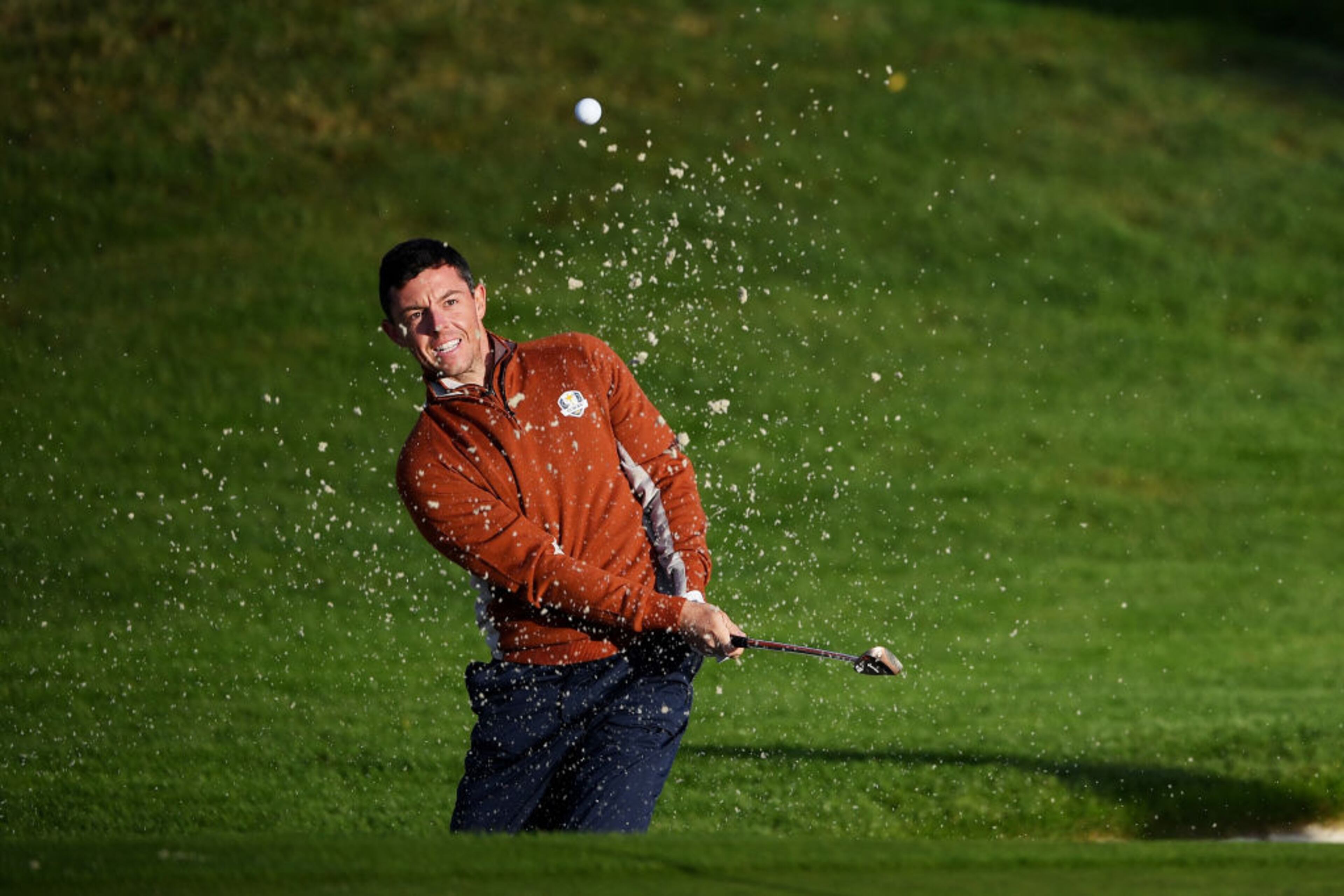 PARIS, FRANCE - SEPTEMBER 29: Rory McIlroy of Europe plays out of a bunker on the third during the morning fourball matches of the 2018 Ryder Cup at Le Golf National on September 29, 2018 in Paris, France. (Photo by Ross Kinnaird/Getty Images)
