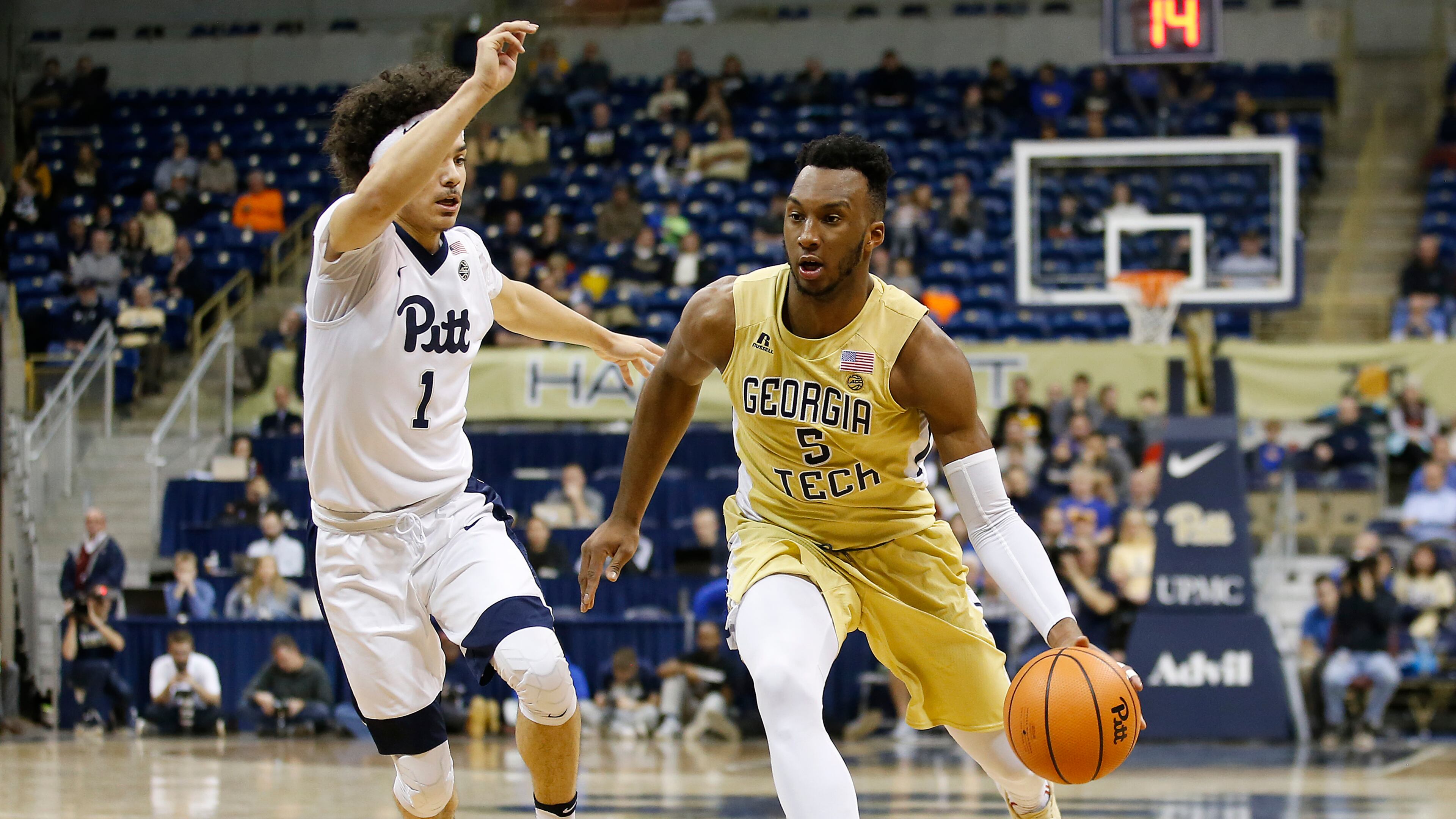 Georgia Tech guard Josh Okogie (5) drives to the basket past Pittsburgh guard Parker Stewart (1) during the first half of an NCAA college basketball game, Saturday, Jan. 13, 2018, in Pittsburgh. (AP Photo/Jared Wickerham)