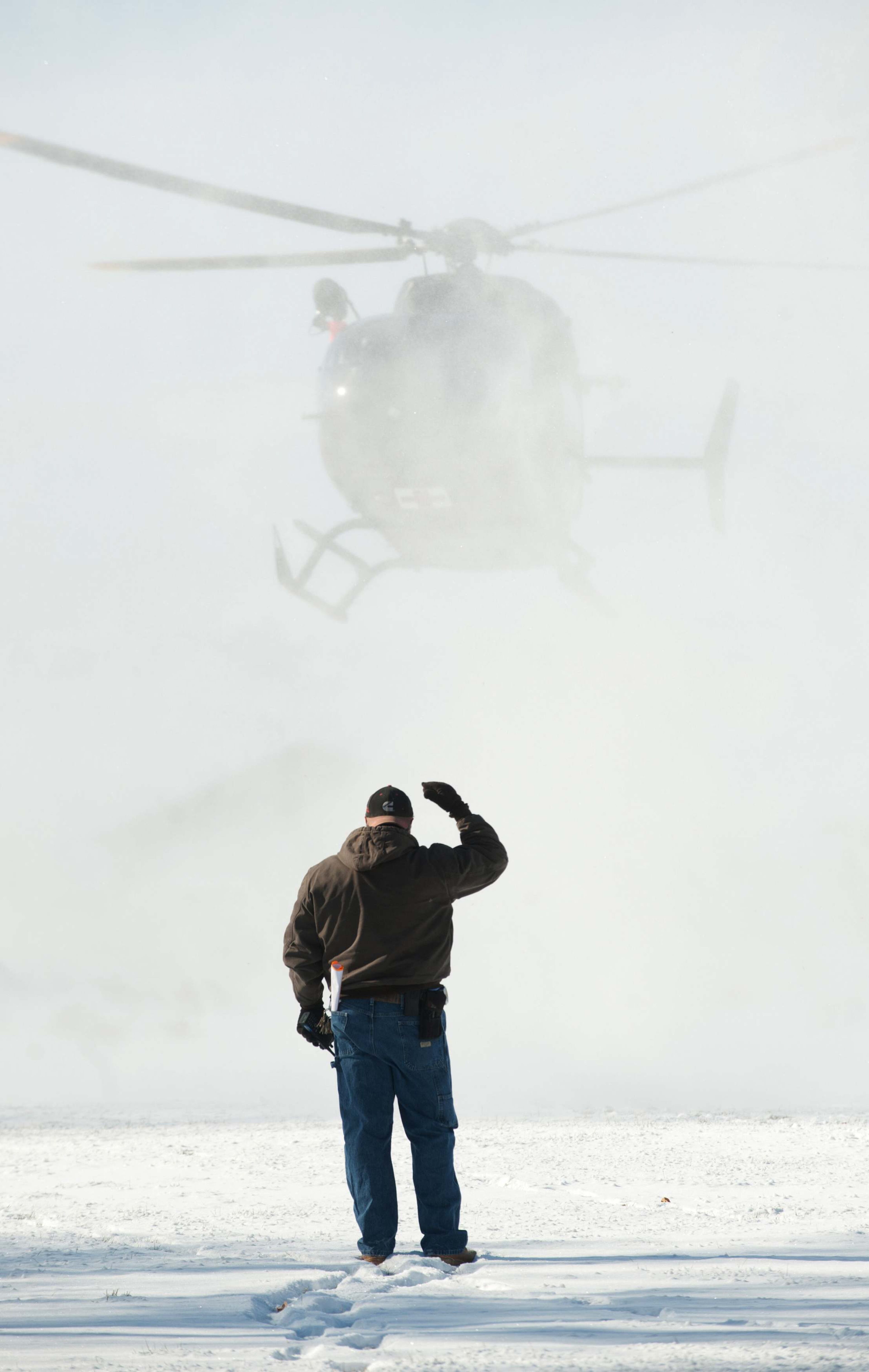 A helicopter that took part in the search for a missing family lands at the Pershing General Hospital after they were found safe in Lovelock, Nevada, December 10, 2013. A Nevada couple and four young children reported missing on Sunday were found safe by rescue workers on Tuesday huddled in a canyon, a dispatch supervisor for the Pershing County Sheriff's Office said. REUTERS/James Glover