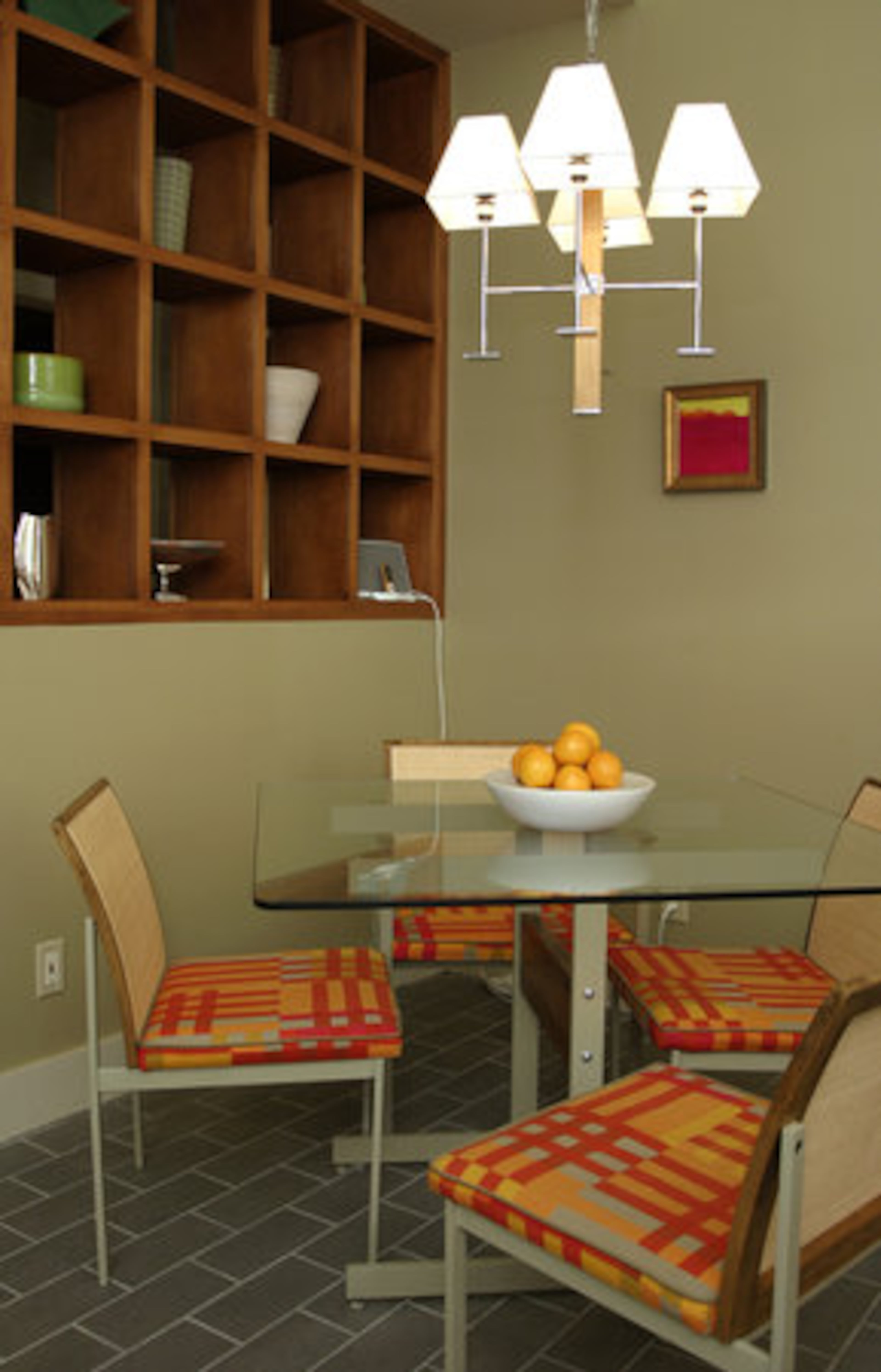 The breakfast area has built-in shelves to display crockware and other collectibles.