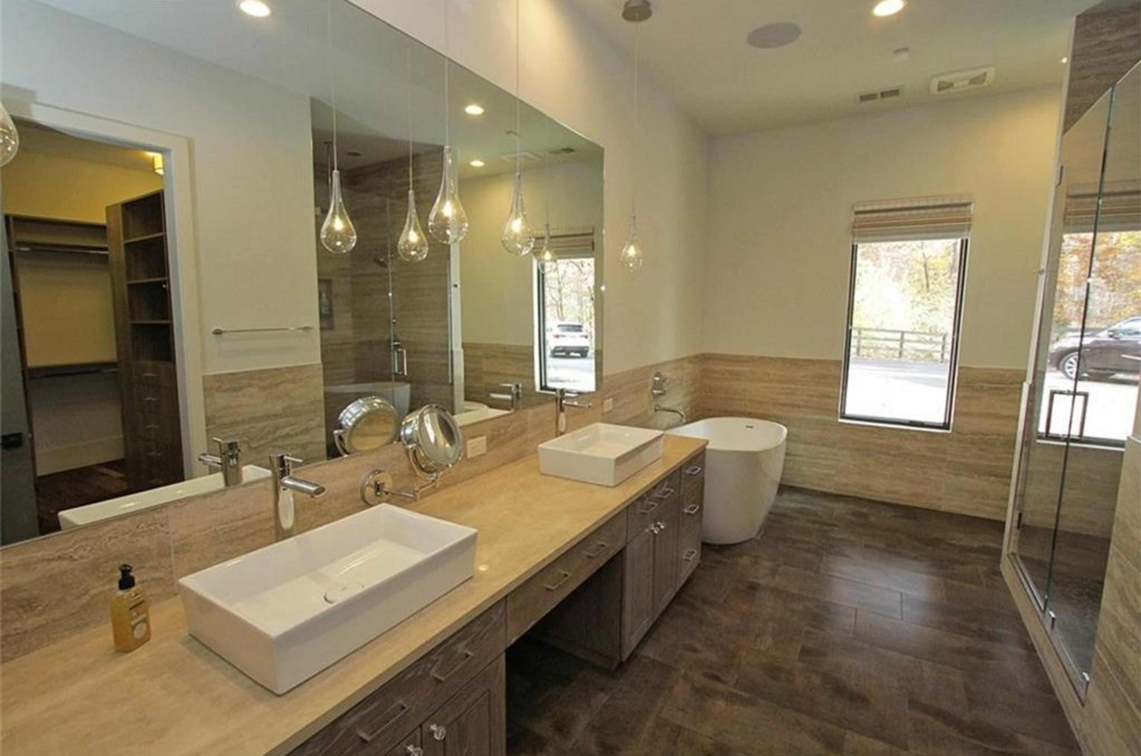 This modern estate at 4056 Hog Mountain Road in Hoschton is listed for $2.195 million. (Photos via zillow.com)