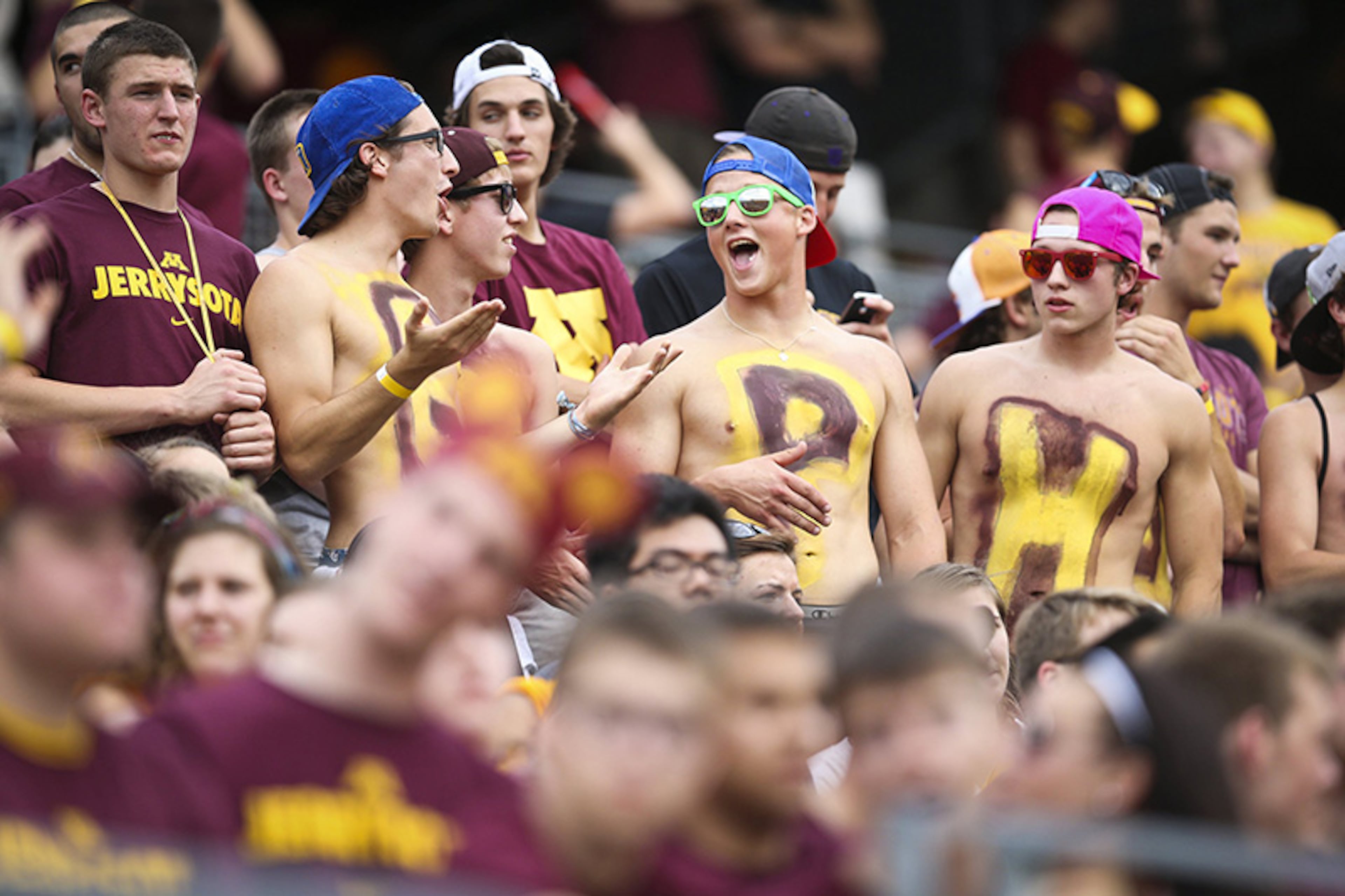 Minnesota fans cheer the Gophers as they play host to UNLV at TCF Bank Stadium at the University of Minnesota in Minneapolis, Minnesota, on Thursday, August, 29, 2013.
