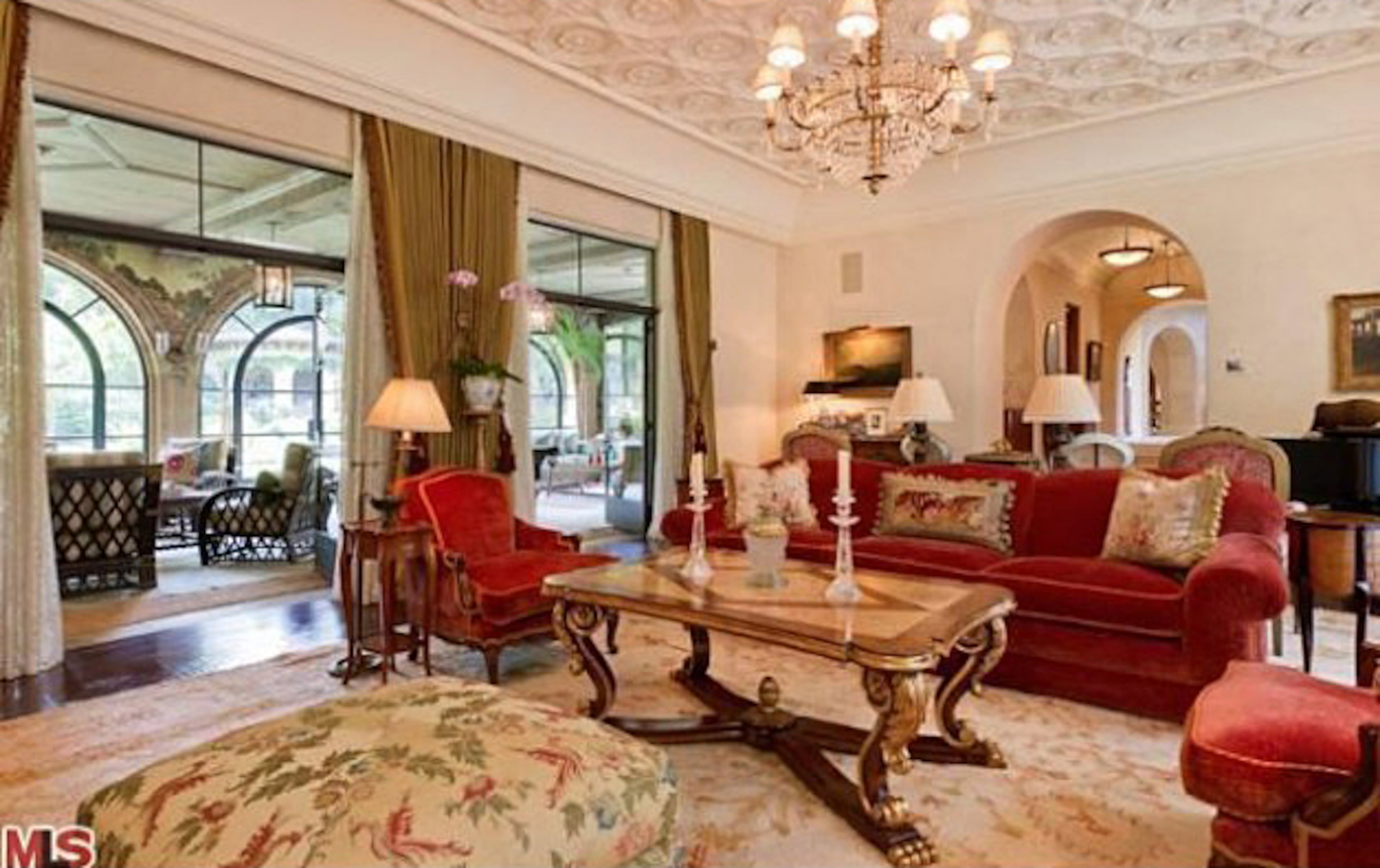 Take a peek inside Christina Aguilera's Beverly Hills mansion. The home, which Aguilera bought for $10.75 million in 2013, features six bedrooms, nine bathrooms, a master suite with a fireplace, a patio, an office, a spa bath, a screening room and wet bars. The property also includes a pool and spa. For more information, visit http://www.toptenrealestatedeals.com/homes/weekly-ten-best-home-deals/2013/5-14-2013/.