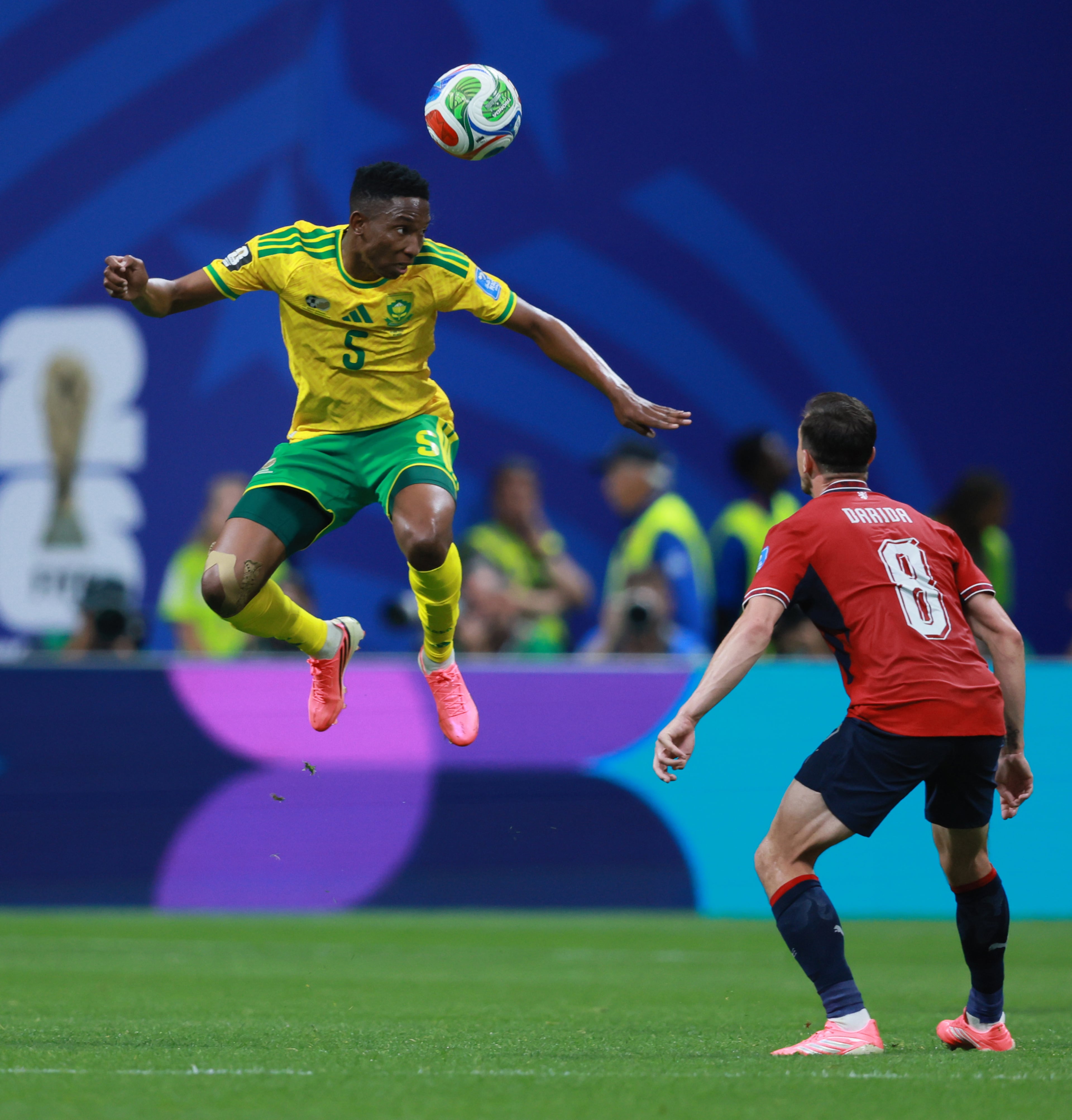 South Africa's Thalente Mbatha (left) heads the ball past Czechia's Vladimir Darida during the first half of the Czechia vs. South Africa game at the FIFA World Cup at Atlanta Stadium on Thursday, June 18, 2026. (Jason Getz/AJC)