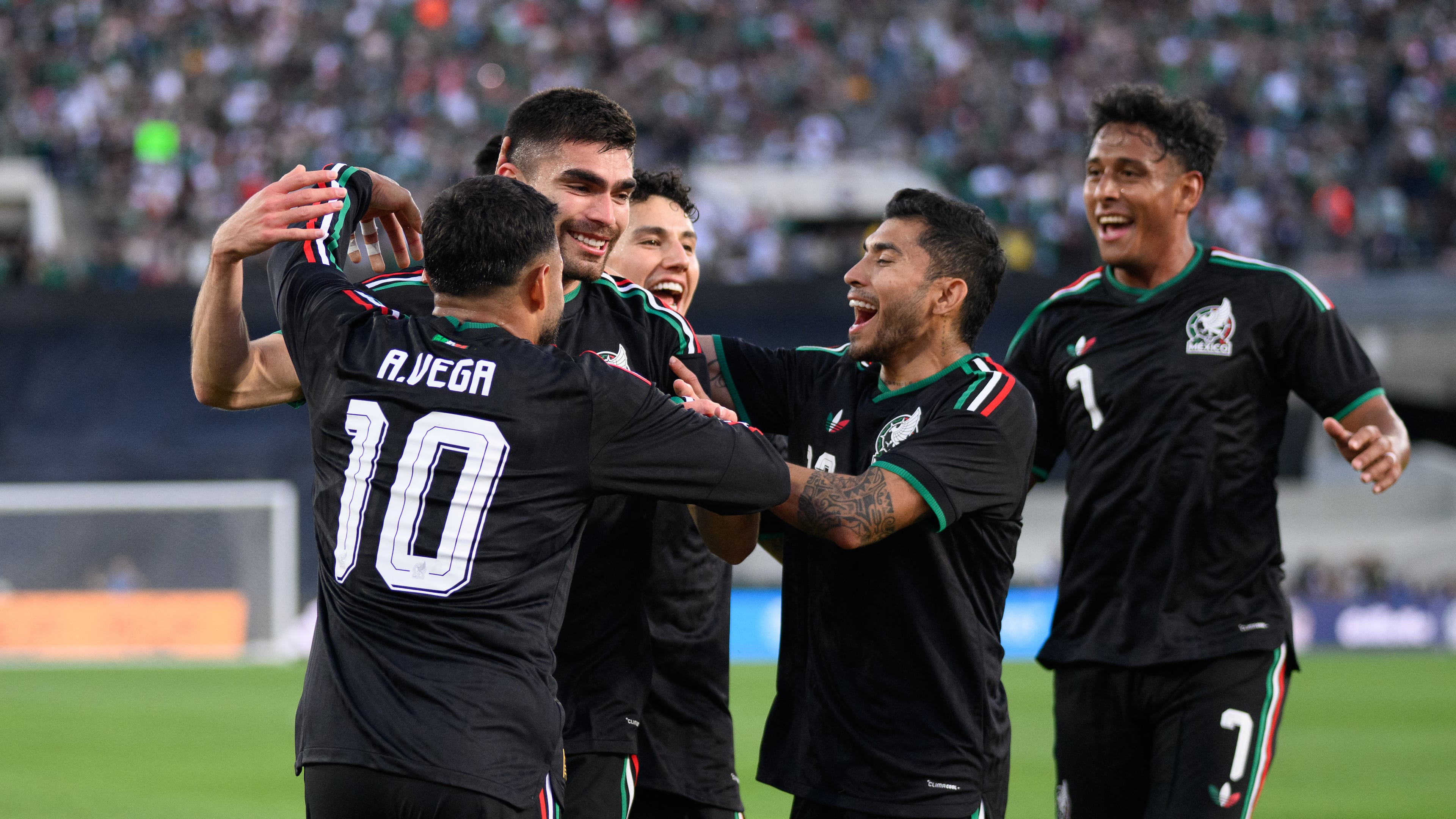 Mexico players celebrate after a goal by Johan Vásquez, second from left, during the first half of an international friendly soccer match against Australia, Saturday, May 30, 2026, in Pasadena, Calif. (AP Photo/Kyusung Gong)