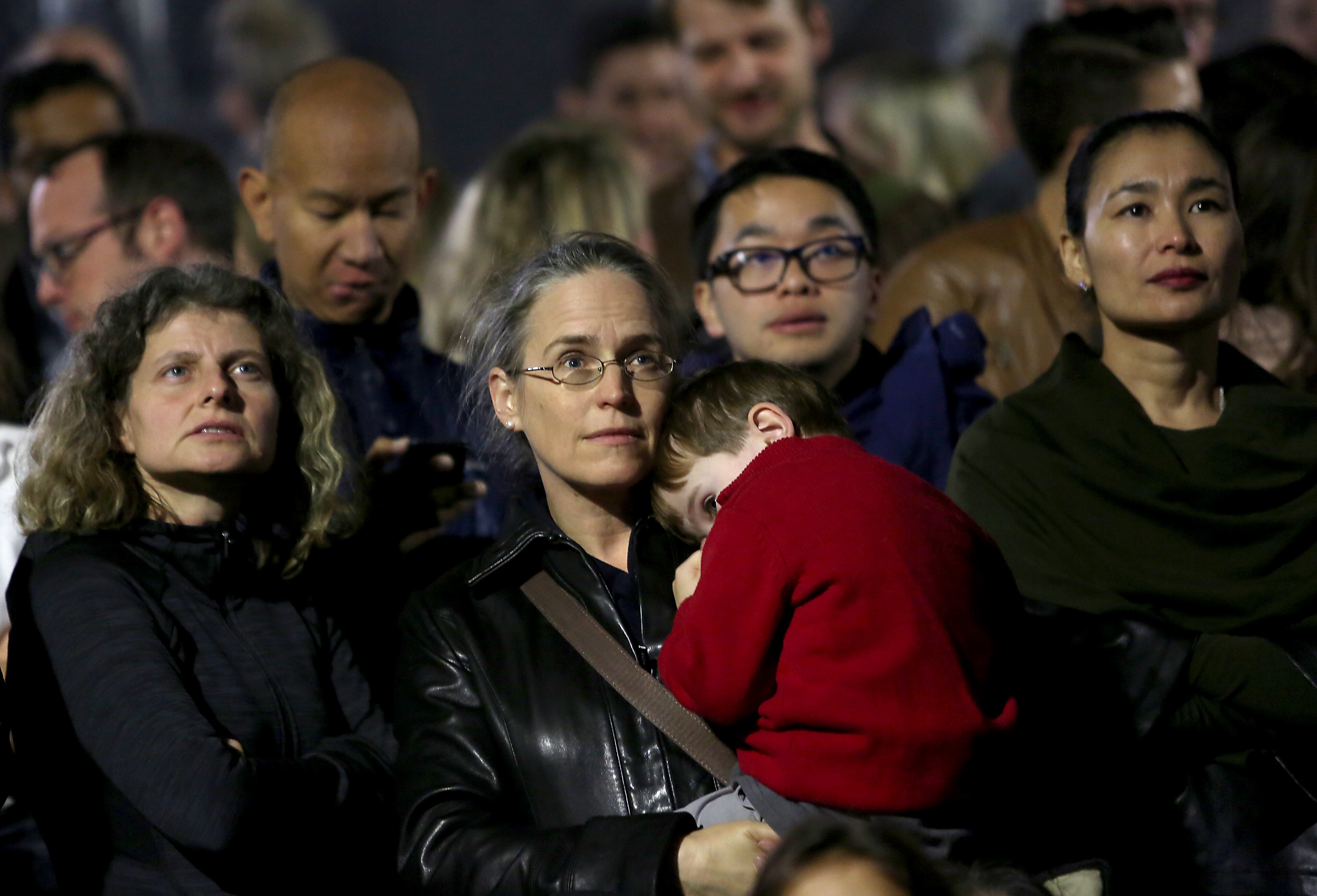 Strong Hillary Clinton supporters watch with worried eyes at Manuel's Tavern in Atlanta, as the results in the 2016 election favor Republican candidate Donald Trump in the early projections on Nov. 8, 2016. (RYON HORNE / RHORNE@AJC.COM)