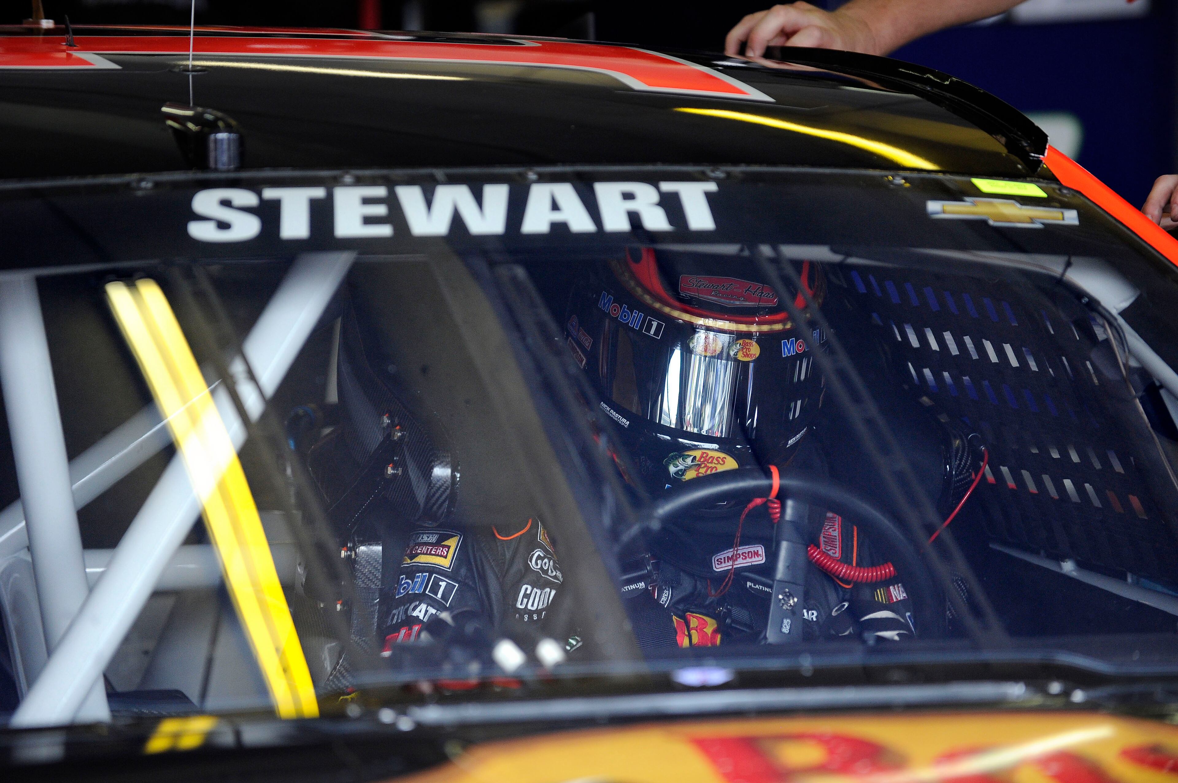 Sprint Cup Series driver Tony Stewart prepares to practice for Sunday's NASCAR Sprint Cup Series auto race at Atlanta Motor Speedway, Saturday, Aug. 30, 2014 in Hampton, Ga. (AP Photo/David Tulis)