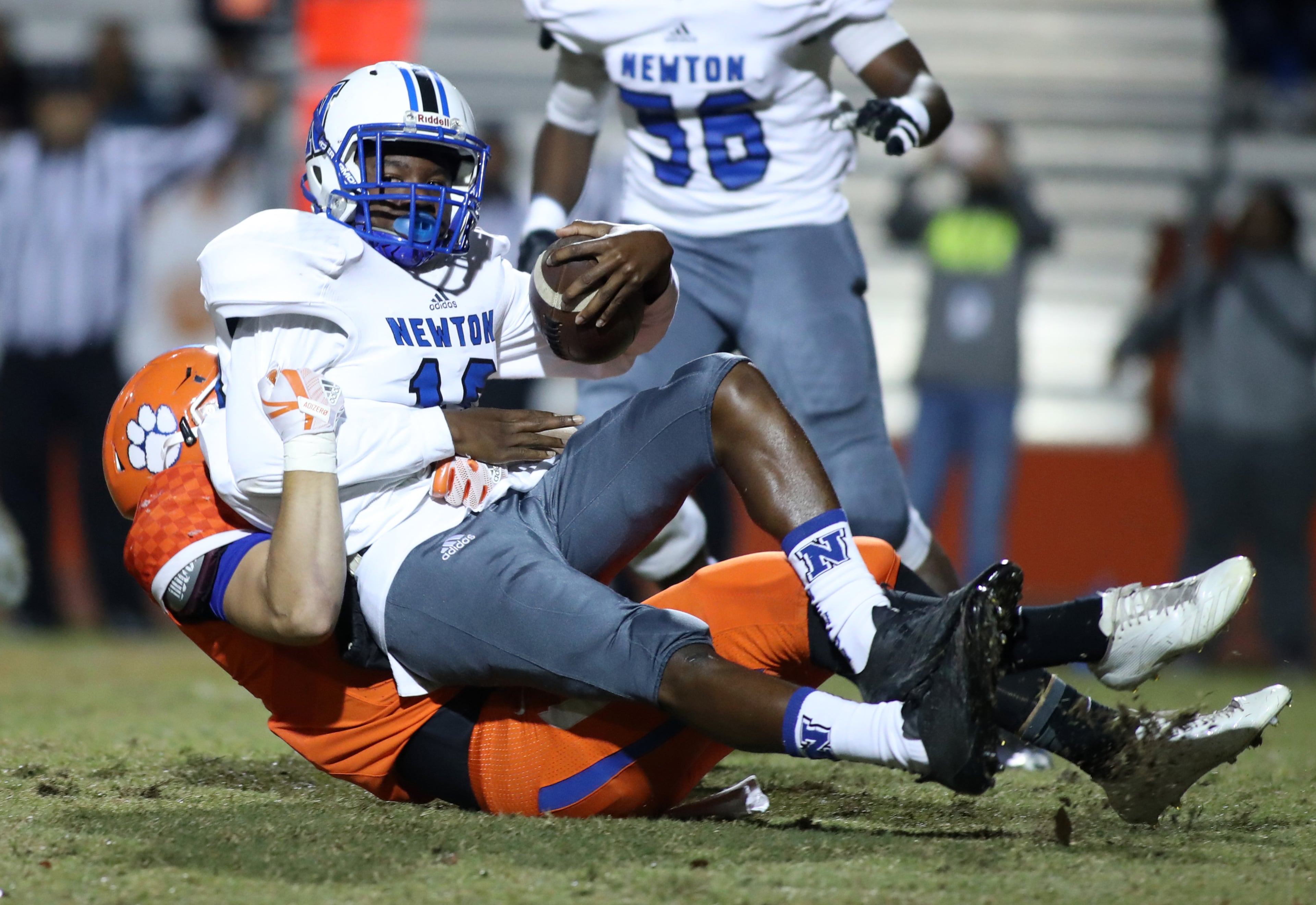 Parkview linebacker Ben Markiewicz (7) tackles Newton quarterback Neal Howard (10) in the first half of their first round of the Class AAAAAAA playoffs at Parkview High School Friday, November 10, 2017, in Lilburn, Ga. PHOTO / JASON GETZ