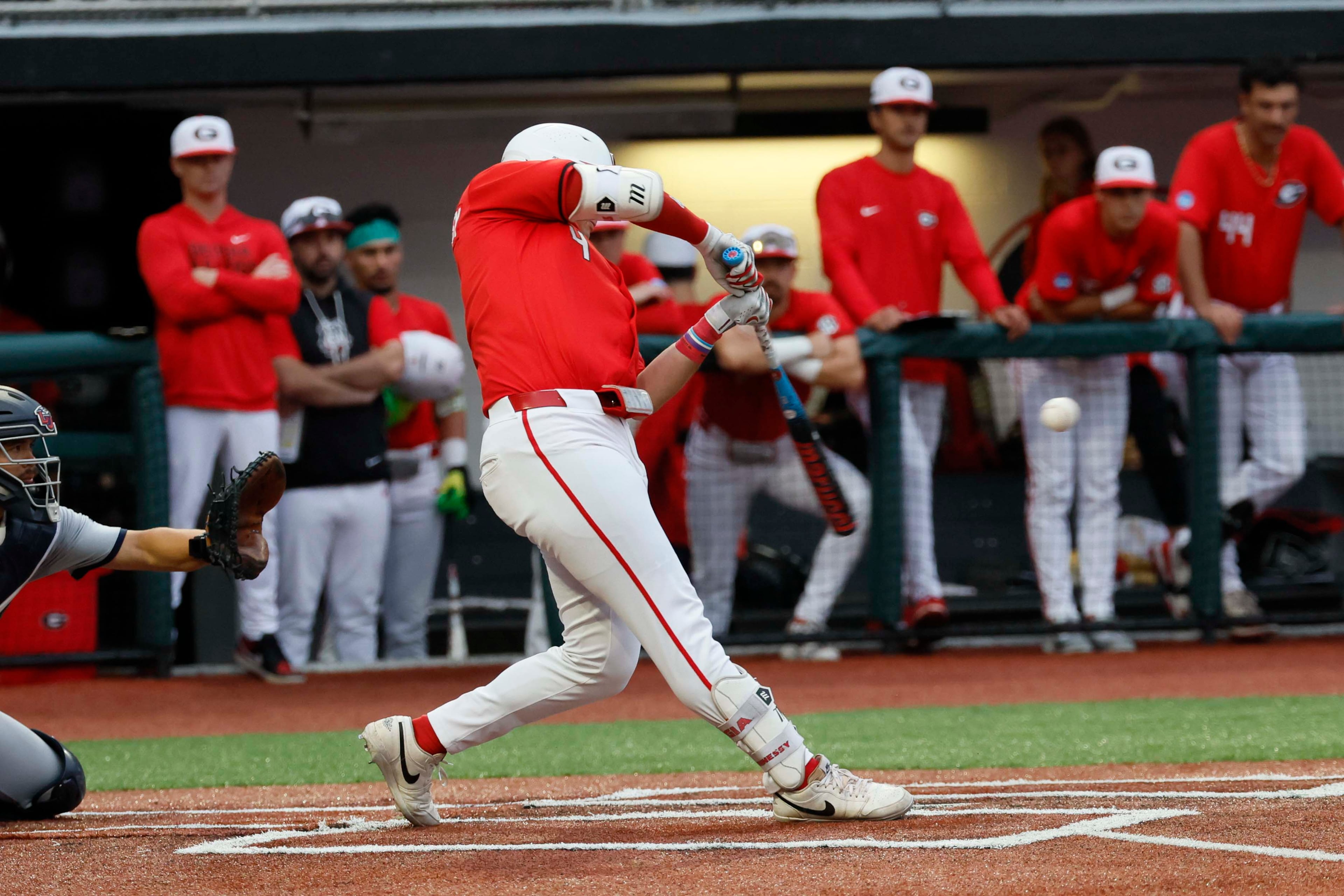 Georgia Bulldogs infielder Michael O’Shaughnessy (4) hits a solo home run during the eighth inning of their NCAA Regional final at Foley Field on Sunday, May 31, 2026, in Athens. (Miguel Martinez/AJC)