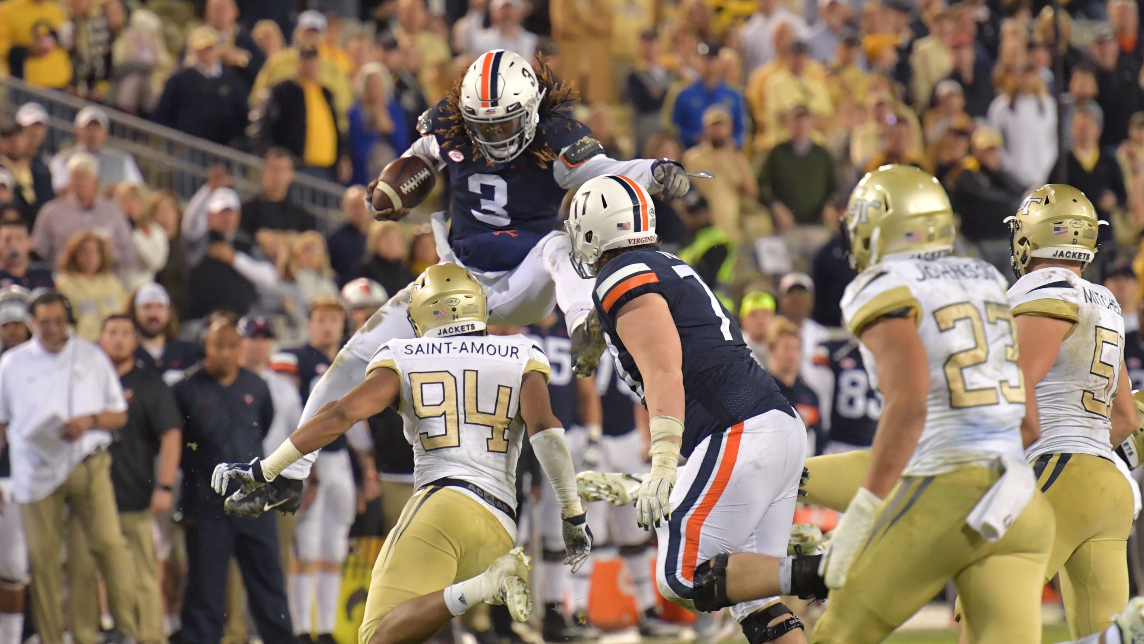 November 17, 2018 Atlanta - Virginia quarterback Bryce Perkins (3) tries to break through against the Georgia Tech in overtime at Bobby Dodd Stadium on Saturday, November 17, 20. Georgia Tech won 30-27 over the Virginia in overtime. HYOSUB SHIN / HSHIN@AJC.COM