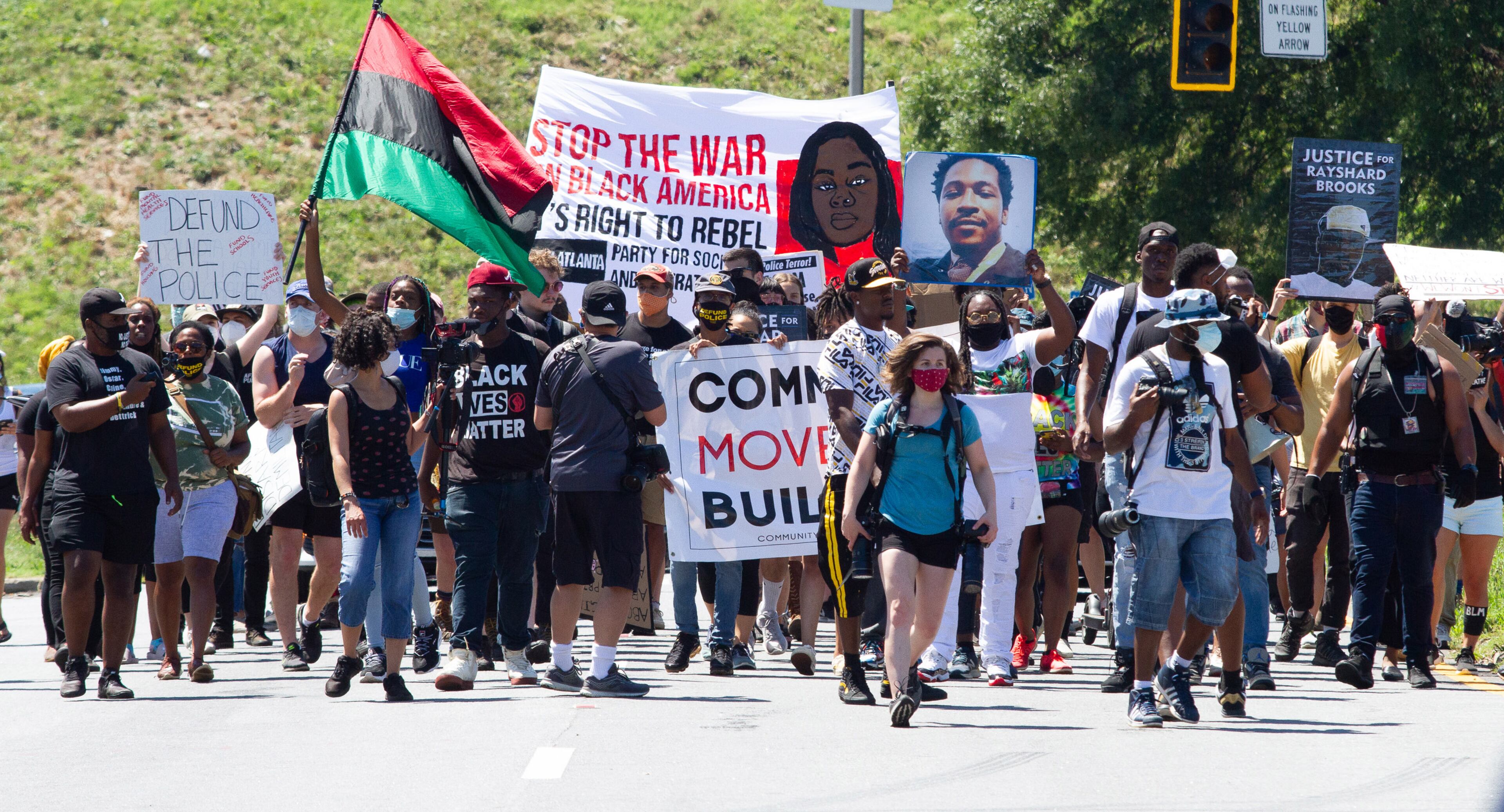 Marchers head for the Wendy's on University Avenue during the 'Take Back the Wendy's' March & Rally in Atlanta on Saturday, July 11, 2020. STEVE SCHAEFER FOR THE ATLANTA JOURNAL-CONSTITUTION STEVE SCHAEFER FOR THE ATLANTA JOURNAL-CONSTITUTION