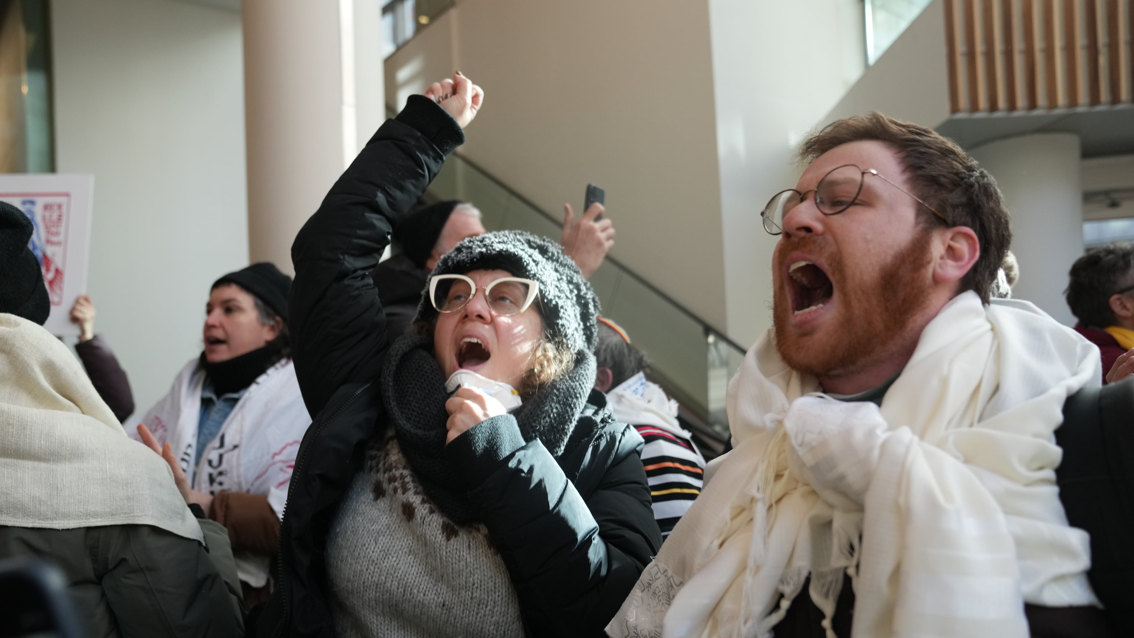 Protesters against Federal immigration agents gather at Target, Friday, Jan. 23, 2026, in Minneapolis. (AP Photo/Abbie Parr)