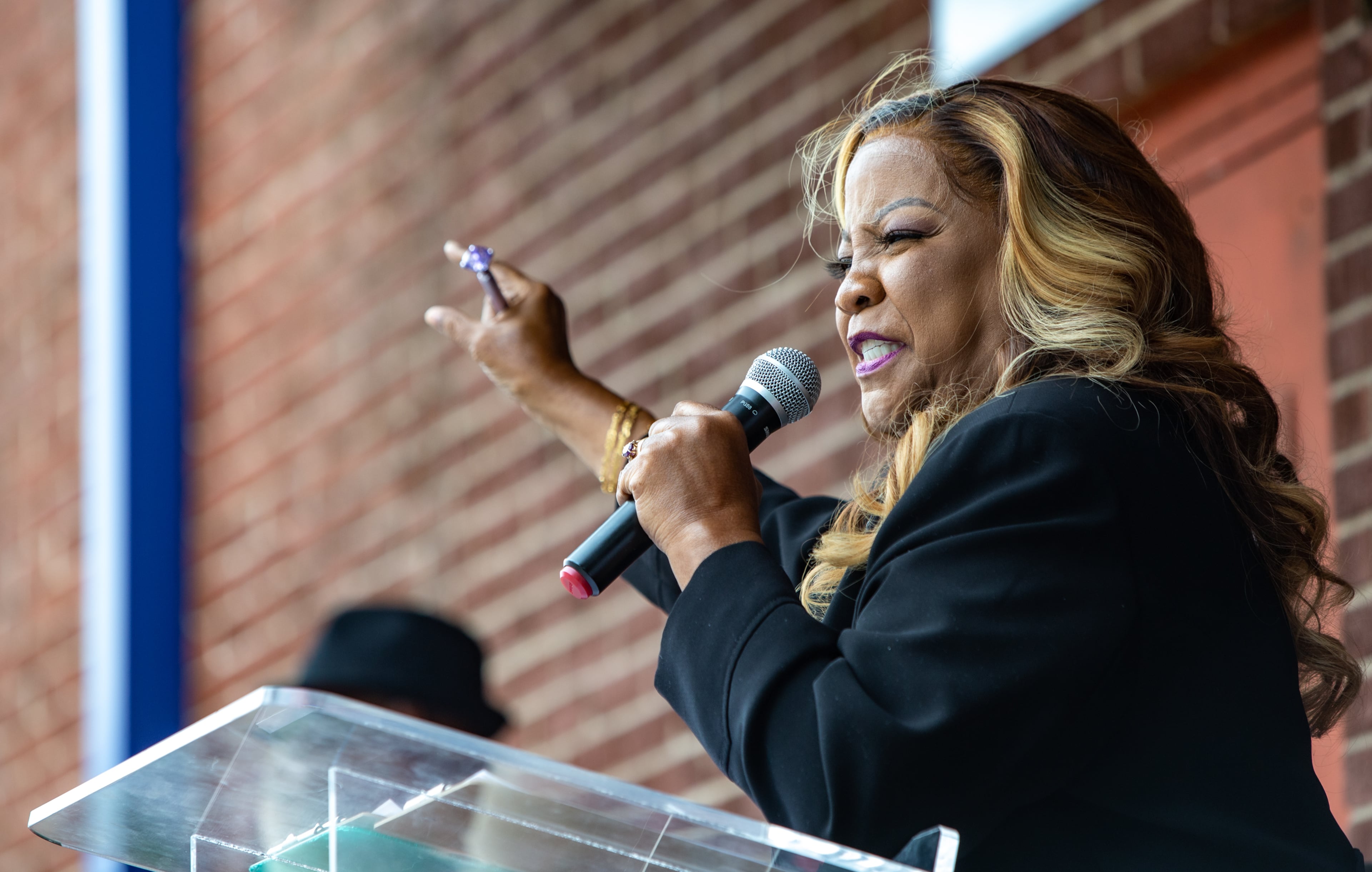 Elisabeth Omilami, the CEO of Hosea Helps, kicks off the holiday season with donors and dignitaries at the organizationÕs South Atlanta warehouse on Thursday, Nov 10, 2022. Omilami is battling stage III breast cancer and continues to lead and expand the mission of her fatherÕs legacy. (Jenni Girtman for The Atlanta Journal-Constitution)
