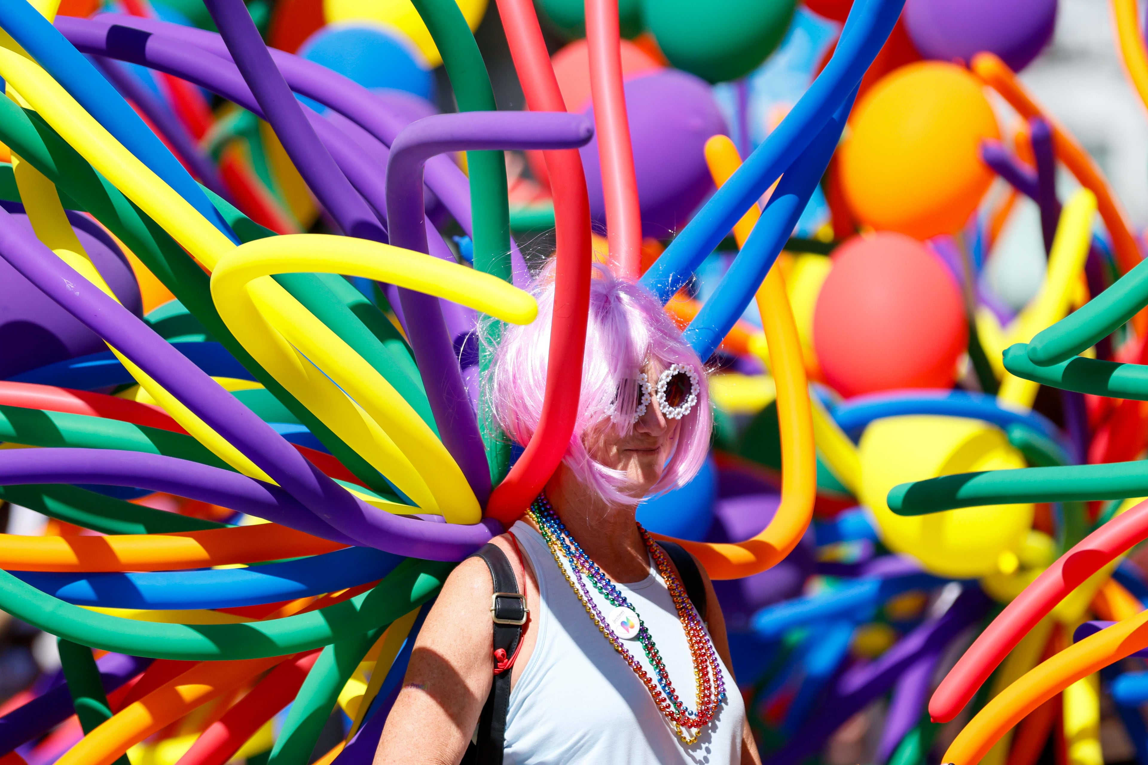 A person in a balloon custom enjoys the annual Pride Parade in Atlanta on Sunday, Oct. 13, 2024.
(Miguel Martinez / AJC)