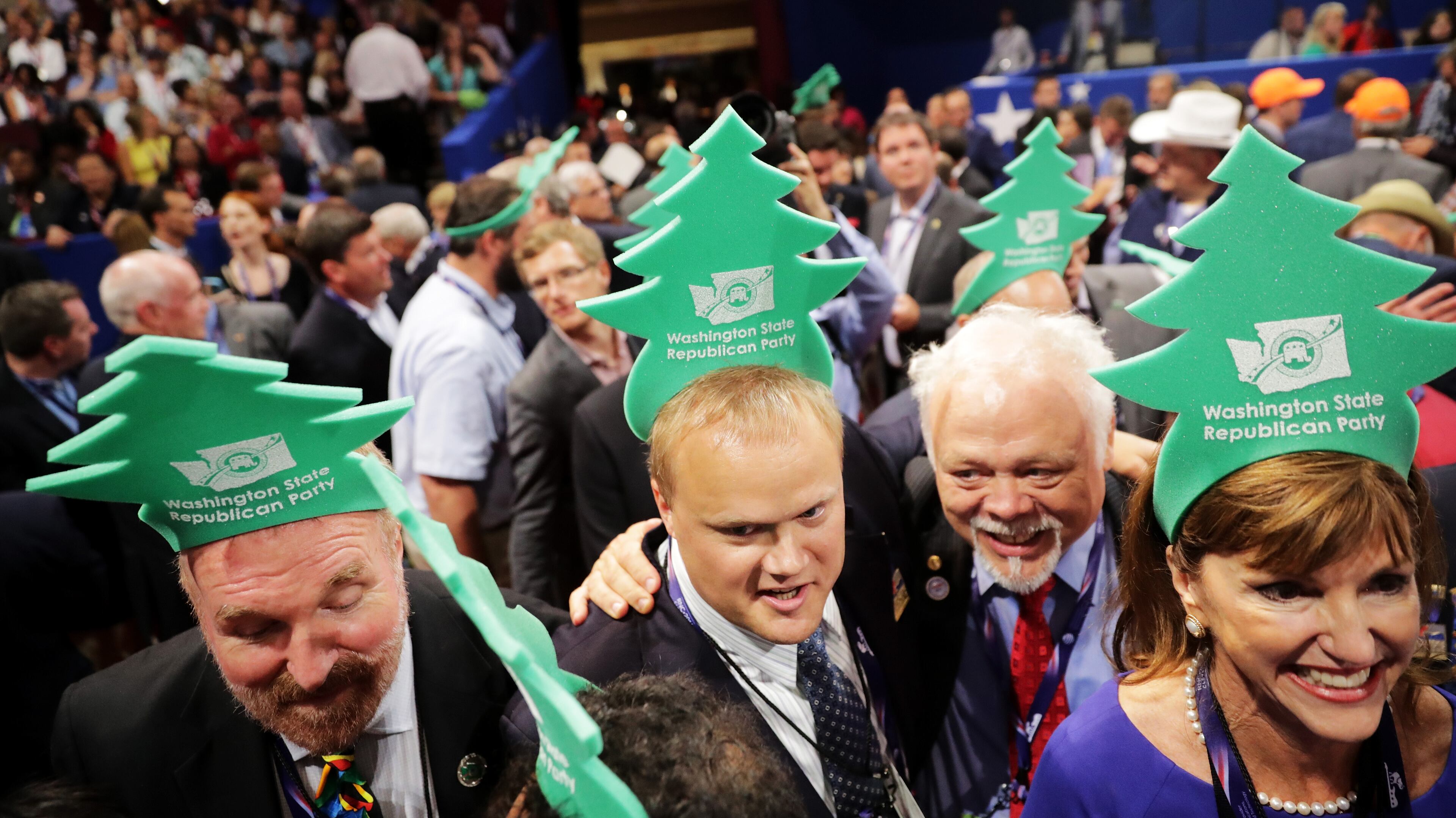 CLEVELAND, OH - JULY 19: Delegates take part in the roll call on the second day of the Republican National Convention on July 19, 2016 at the Quicken Loans Arena in Cleveland, Ohio. Republican presidential candidate Donald Trump received the number of votes needed to secure the party's nomination. An estimated 50,000 people are expected in Cleveland, including hundreds of protesters and members of the media. The four-day Republican National Convention kicked off on July 18. (Photo by Chip Somodevilla/Getty Images)