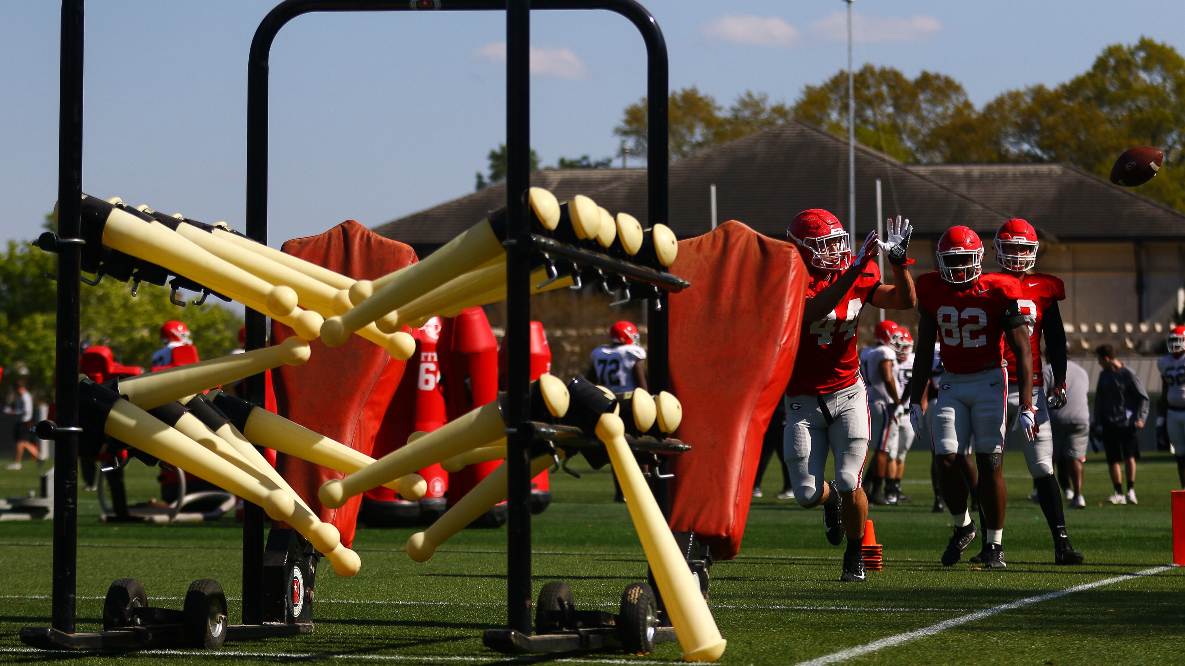Georgia tight end Peyton Mercer prepares to catch the football before running through a gauntlet machine during spring practice Tuesday, April 2, 2019, in Athens.