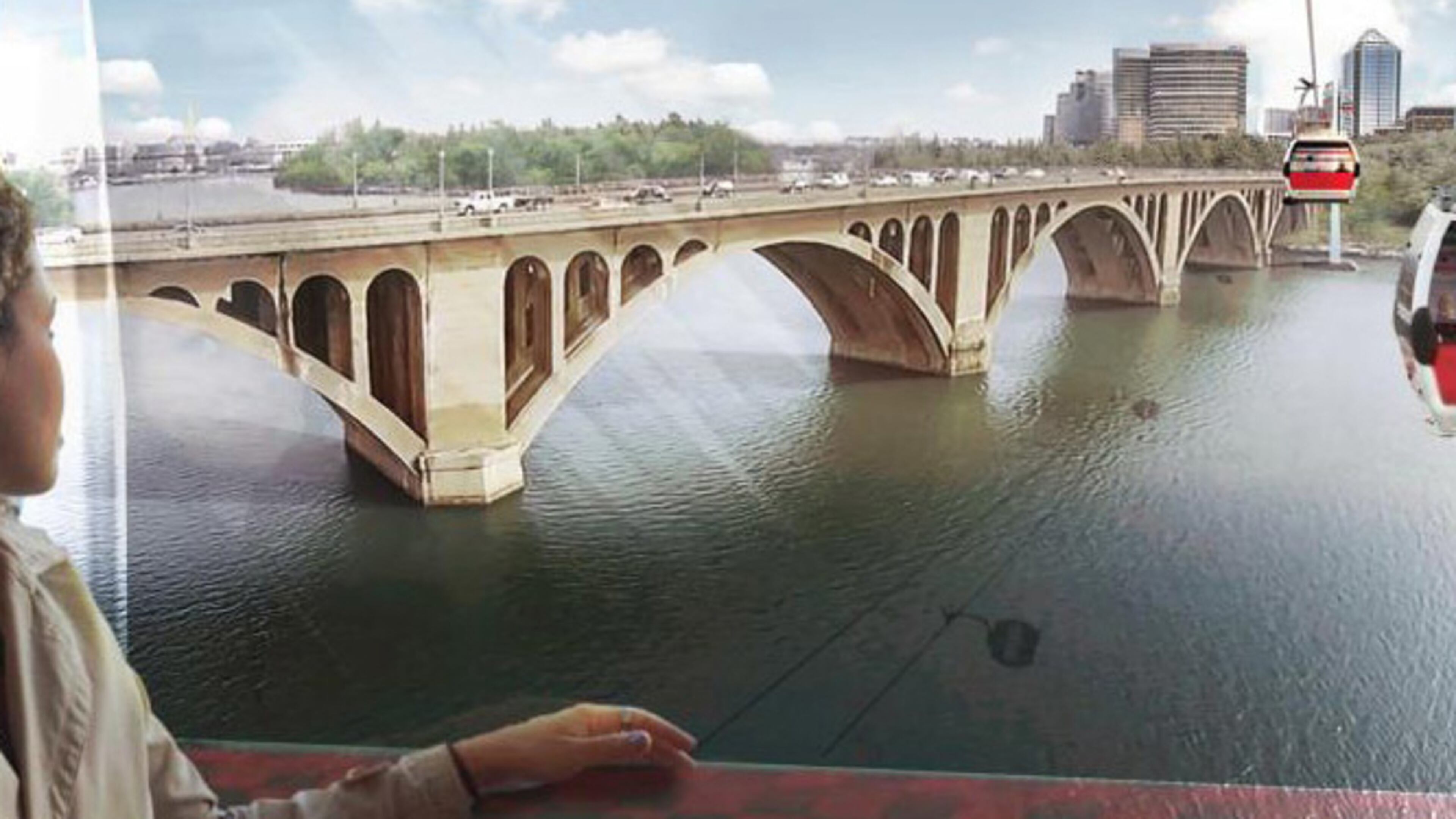 This artist rendering provided by ZGF Architects LLP shows the proposed ski resort-style gondola system over the Potomac River connecting Washington and Virginia. The system is technically feasible and would cost $80 million to $90 million to build, according to a study released Thursday, Nov. 3, 2016. (ZGF Architects LLP via AP)