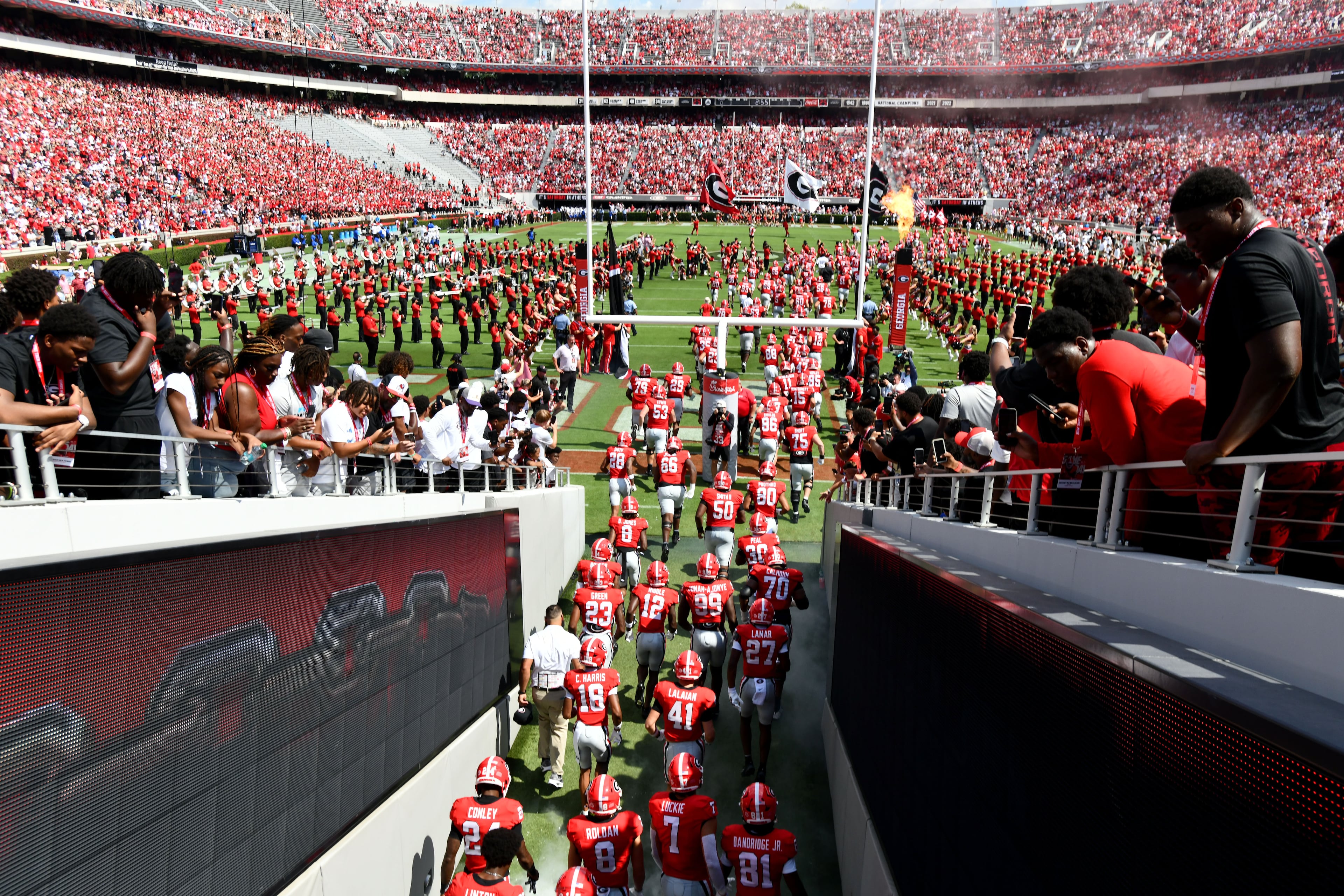 Georgia players enter the field before Georgia hosts Tennessee State in their season opener at Sanford Stadium on Saturday, Sept. 5, 2026, in Athens, Ga. (Hyosub Shin/AJC)