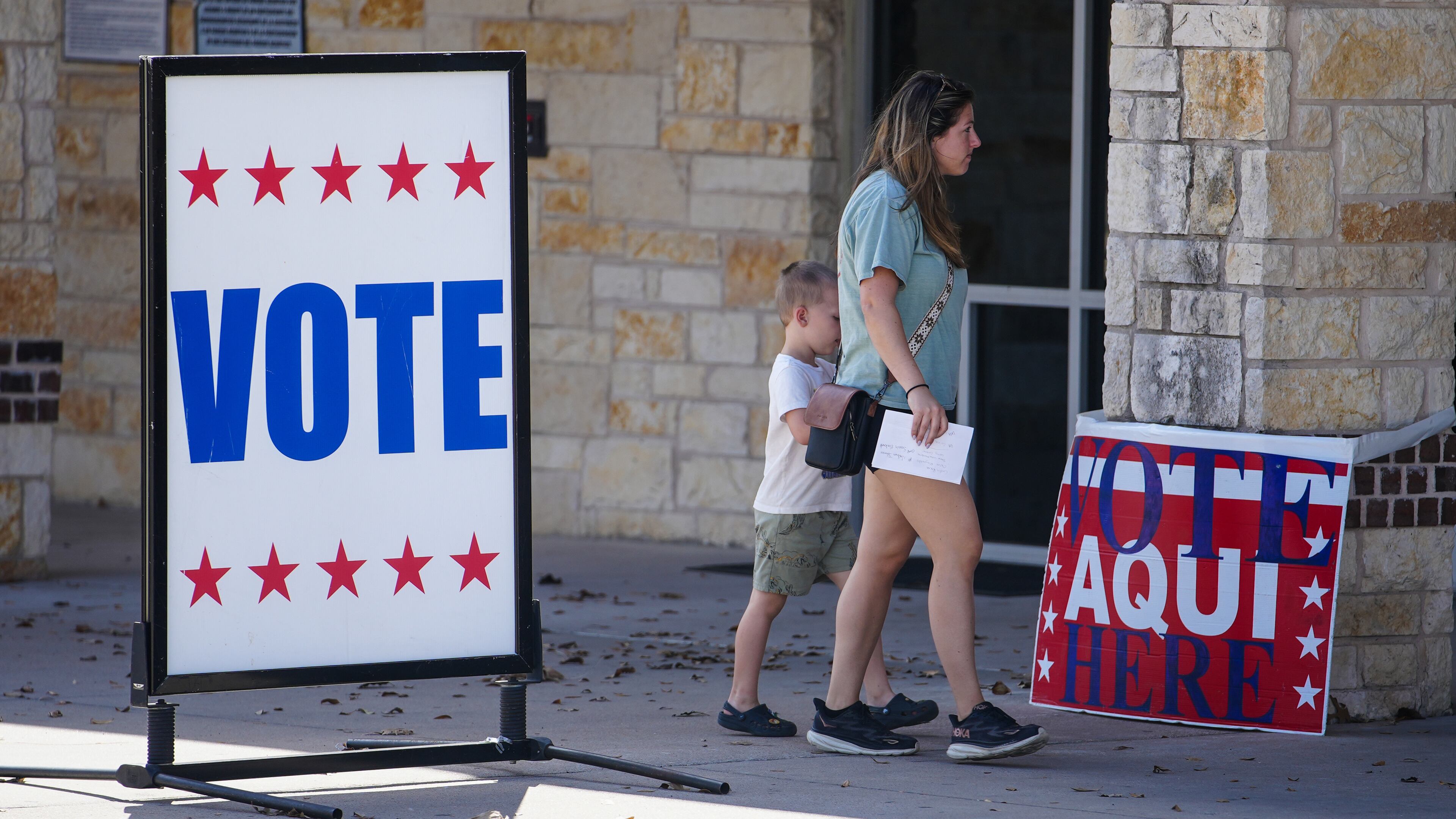 Voters in central Texas make their way to an active polling station to vote in Pflugerville, Texas, Tuesday, March 3, 2026. (Ricardo B. Brazziell/Austin American-Statesman via AP)
