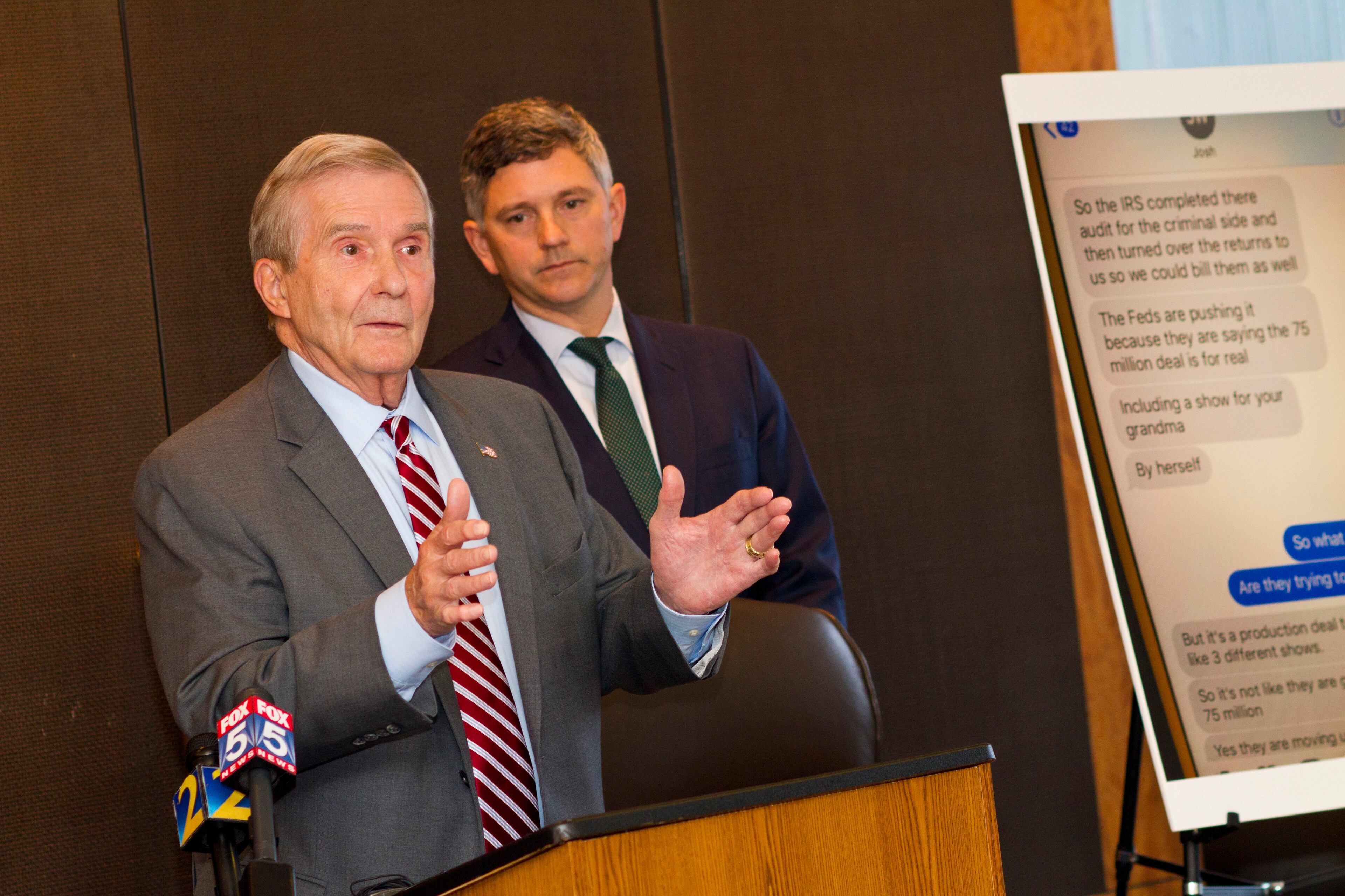 Michael Bowers give a press conference after filing a lawsuit for their clients Todd and Julie Chrisley. Christopher Anulewicz, at right, is also on the legal team handling the case.