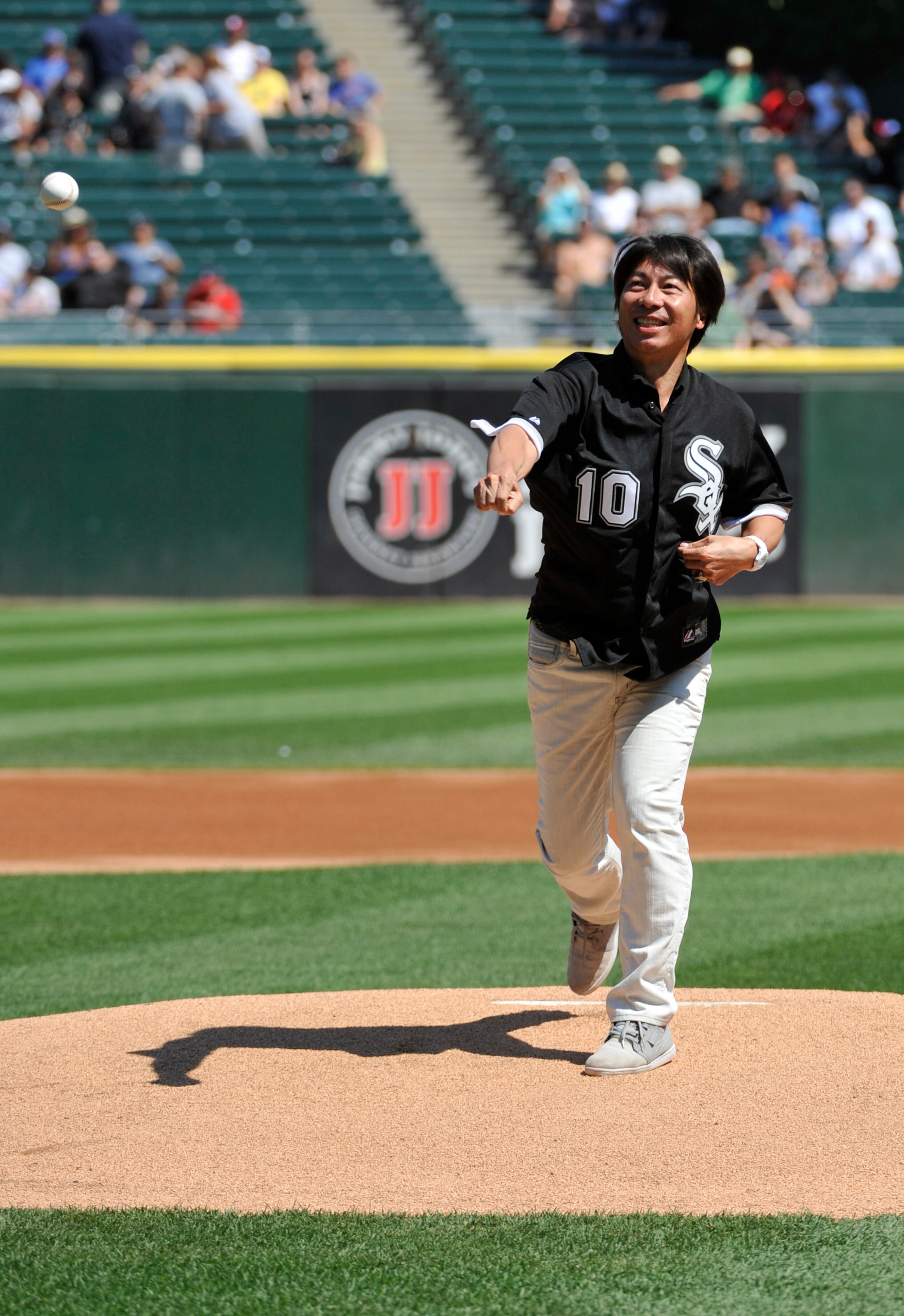 Former Chicago White Sox pitcher Shingo Takatsu throws out the first pitch before the game between the Chicago White Sox and the Atlanta Braves on July 20, 2013 at U.S. Cellular Field in Chicago, Illinois. (Photo by David Banks/Getty Images)