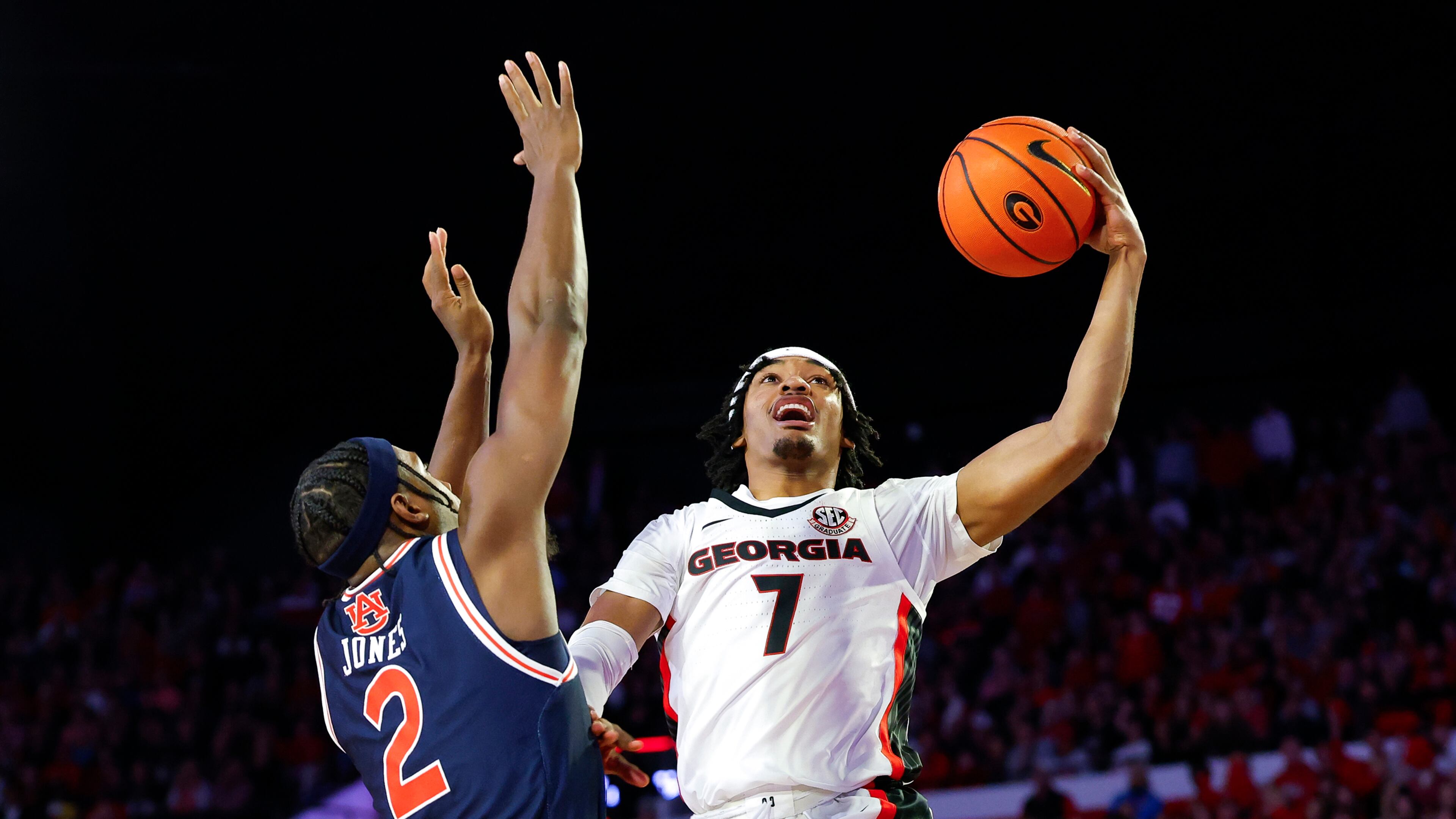 Georgia's Tyrin Lawrence (7) goes up for a shot against Auburn's Denver Jones (2) during the first half at Stegeman Coliseum on Saturday, Jan. 18, 2025, in Athens, Georgia. (Todd Kirkland/Getty Images/TNS)
